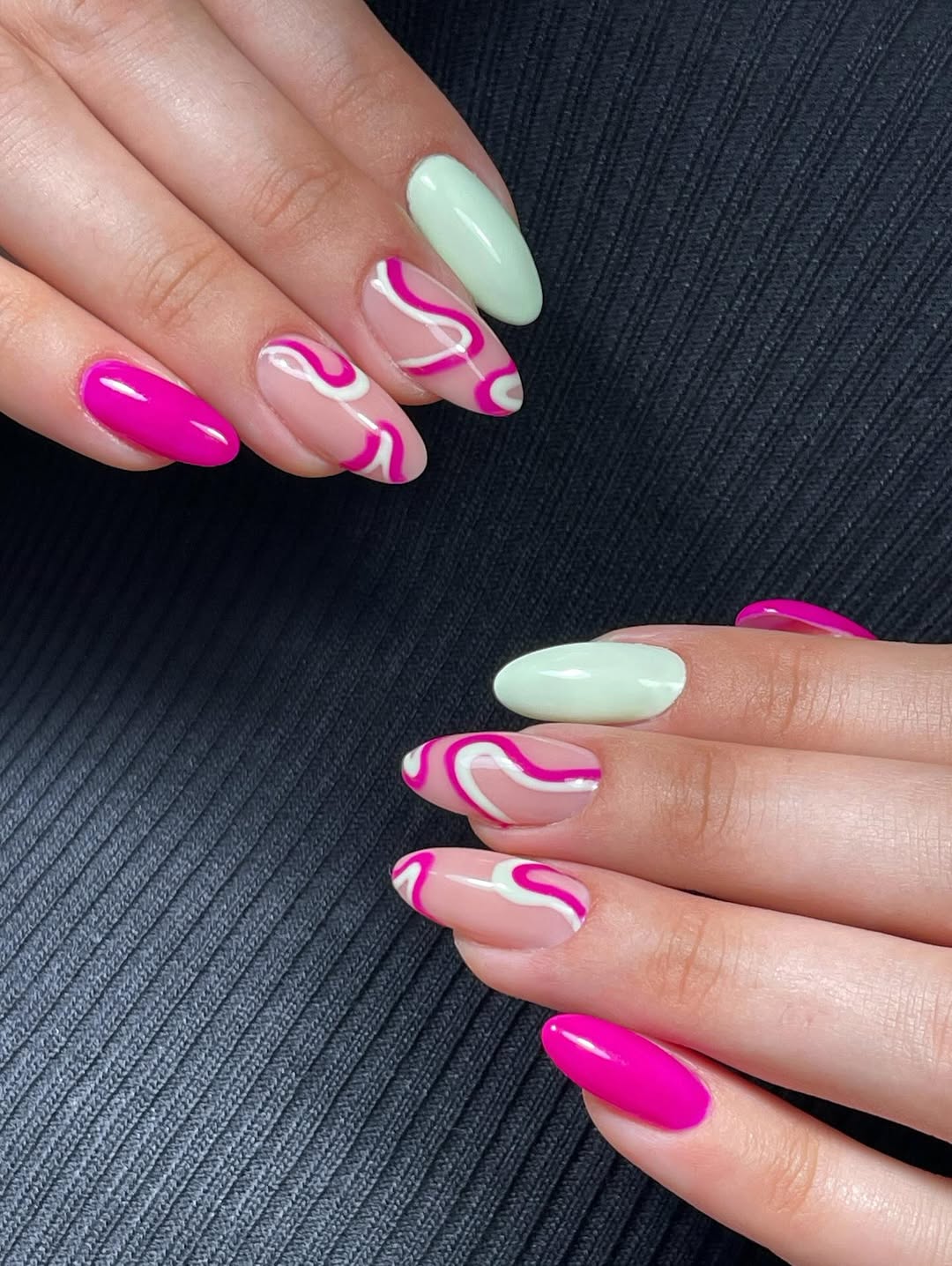 Hot Pink Wavy Swirl Almond Nails