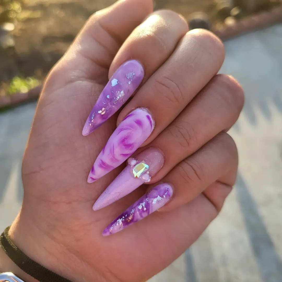 Lavender Marble Stiletto Nails with Gems