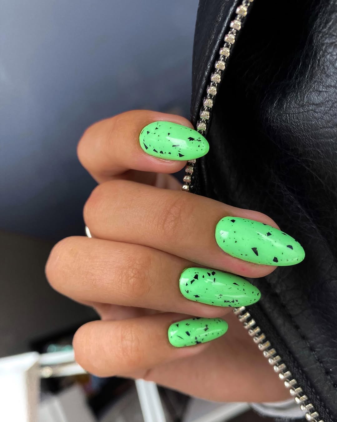 Lime Green Black Speckle Almond Nails