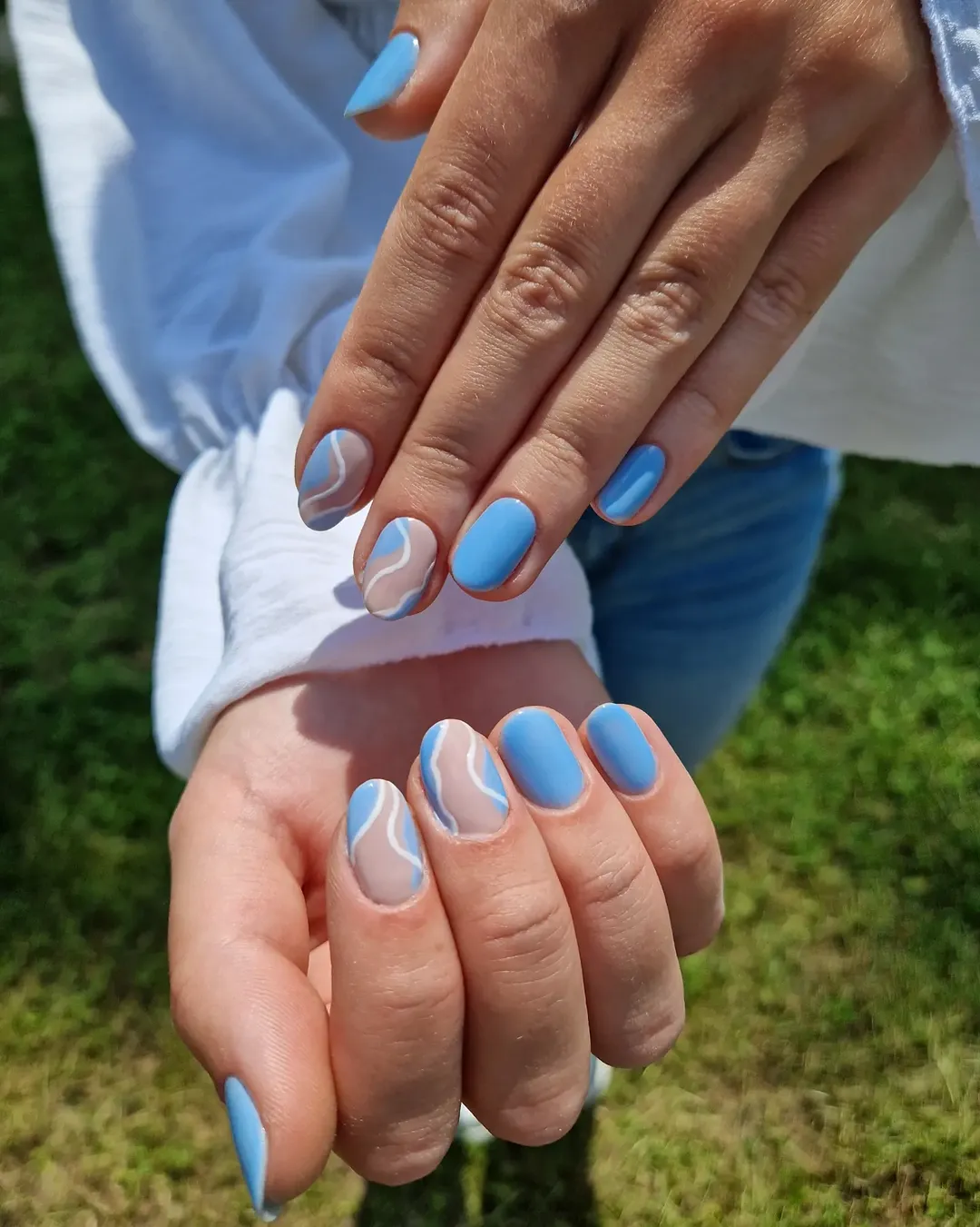 Matte Sky Blue Wavy Swirl Short Oval Nails