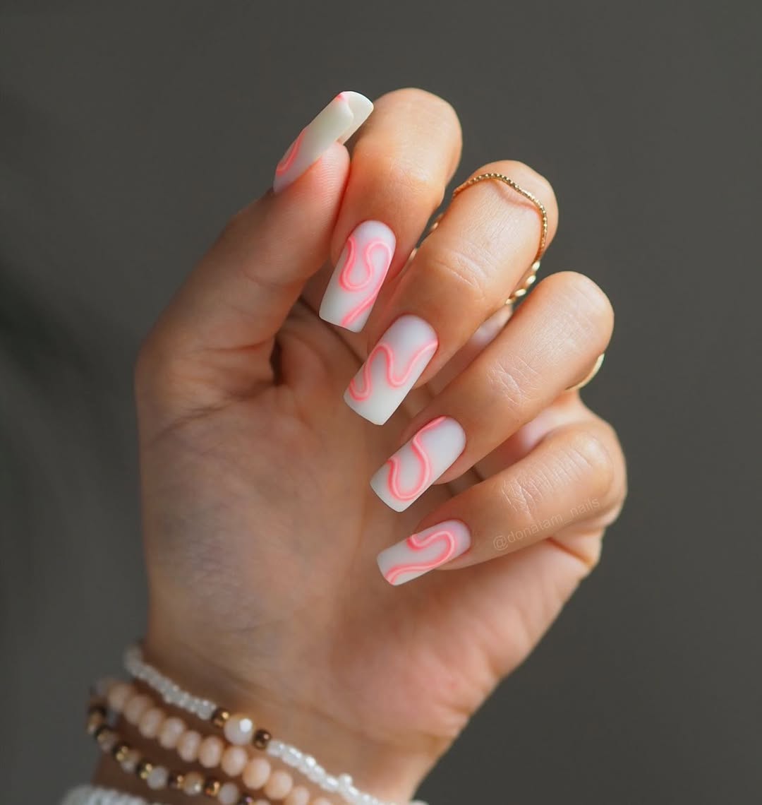 Matte White and Neon Pink Swirl Coffin Nails