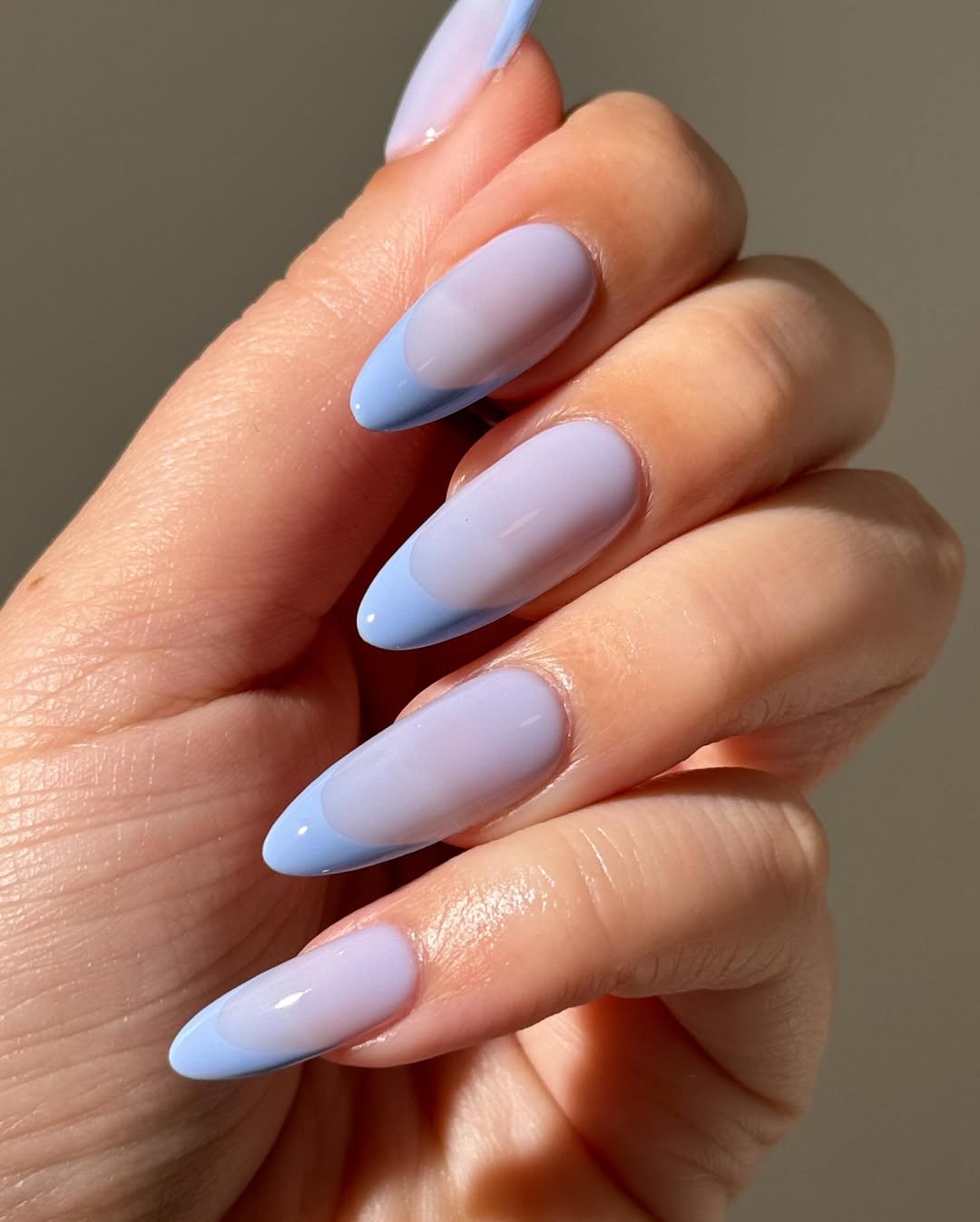 Milky Lavender Blue French Tip Almond Nails