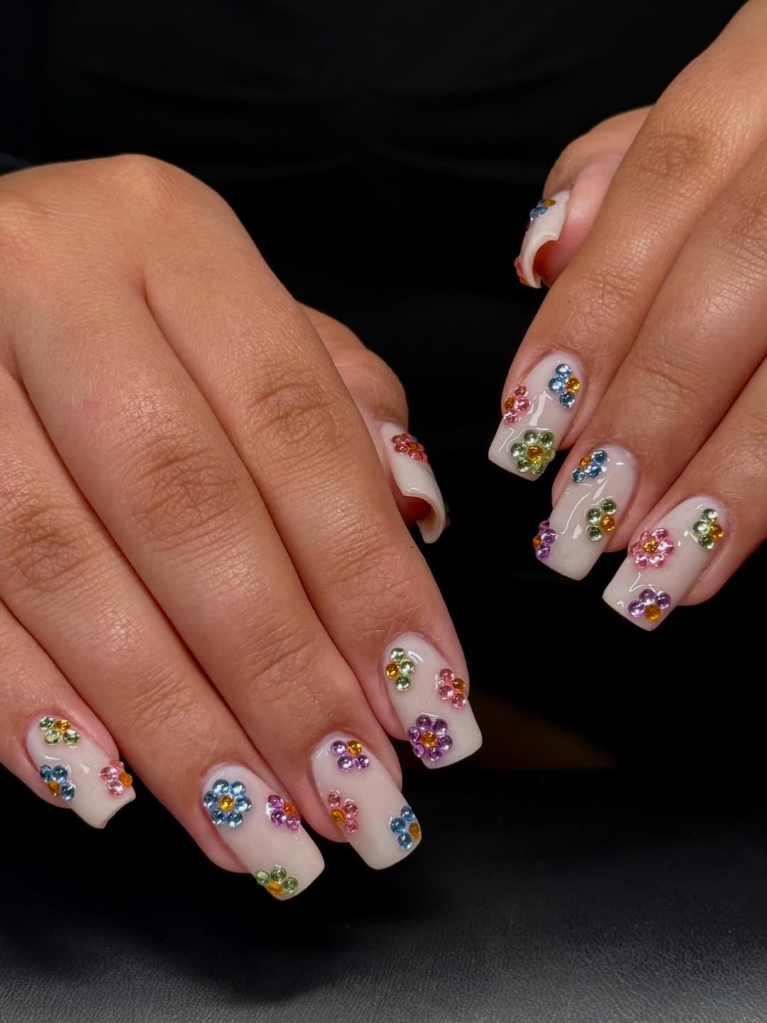 Milky White Nails with Colorful Gem Flower Art