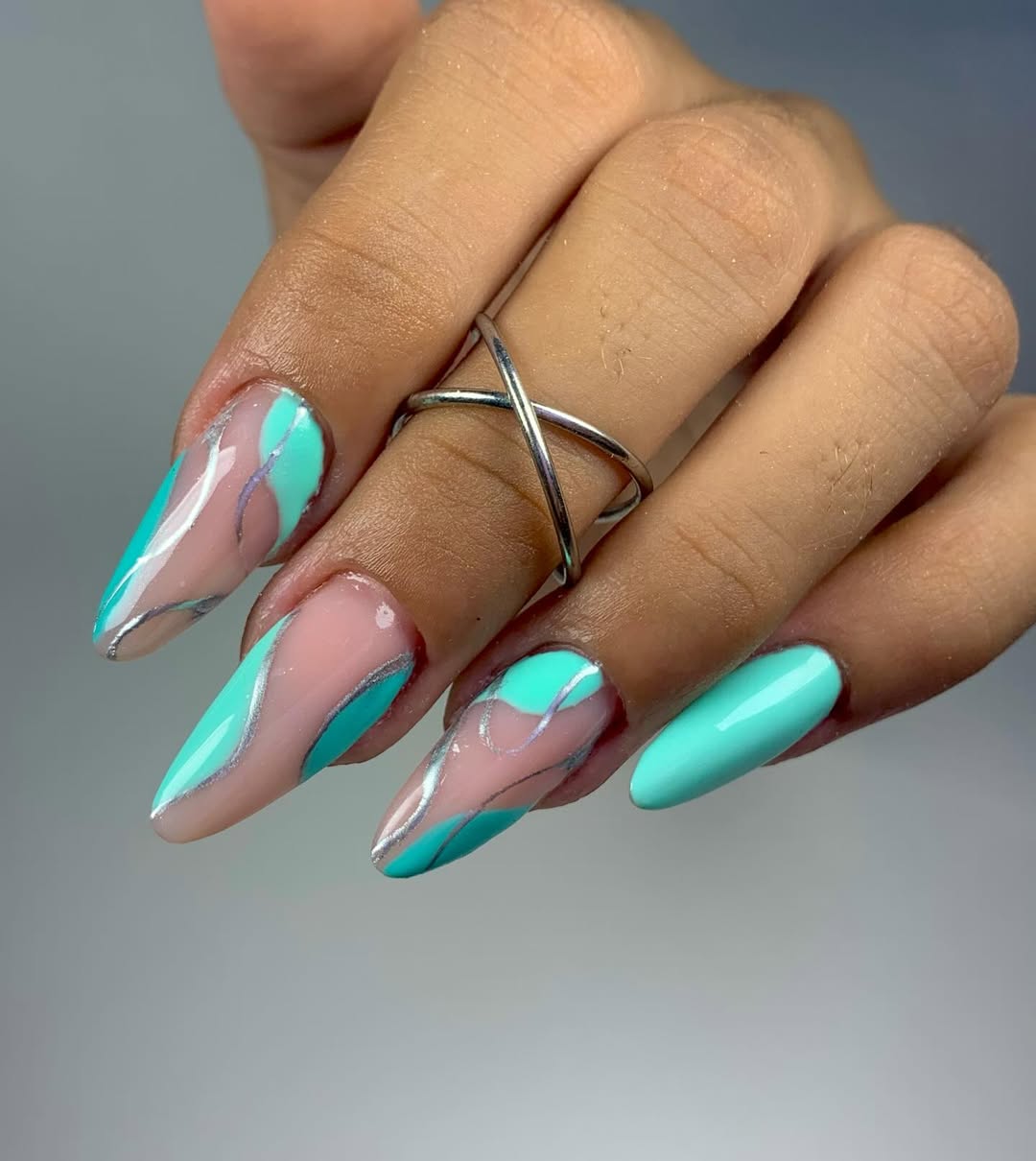 Mint Green Swirls Silver Accents Almond Nails
