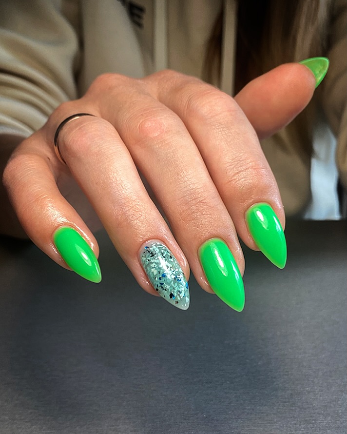 Neon Green Stiletto Nails With Glitter Accent