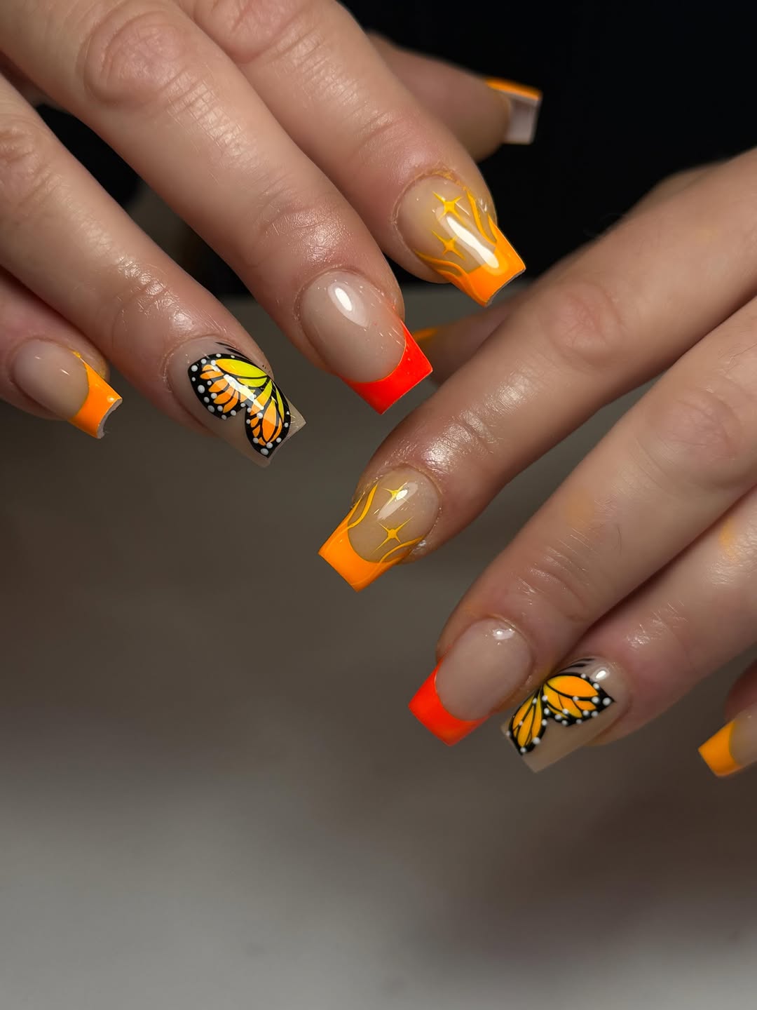 Neon Orange Butterfly French Tip Square Nails