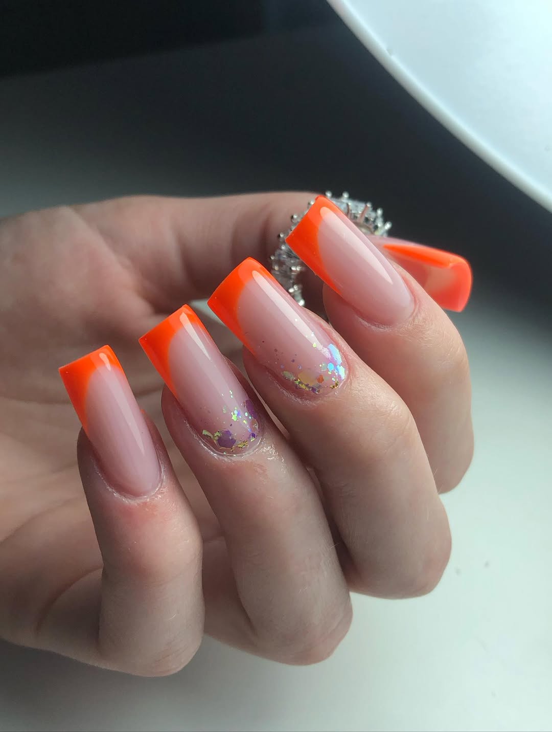 Neon Orange French Tips with Glitter Embellishment