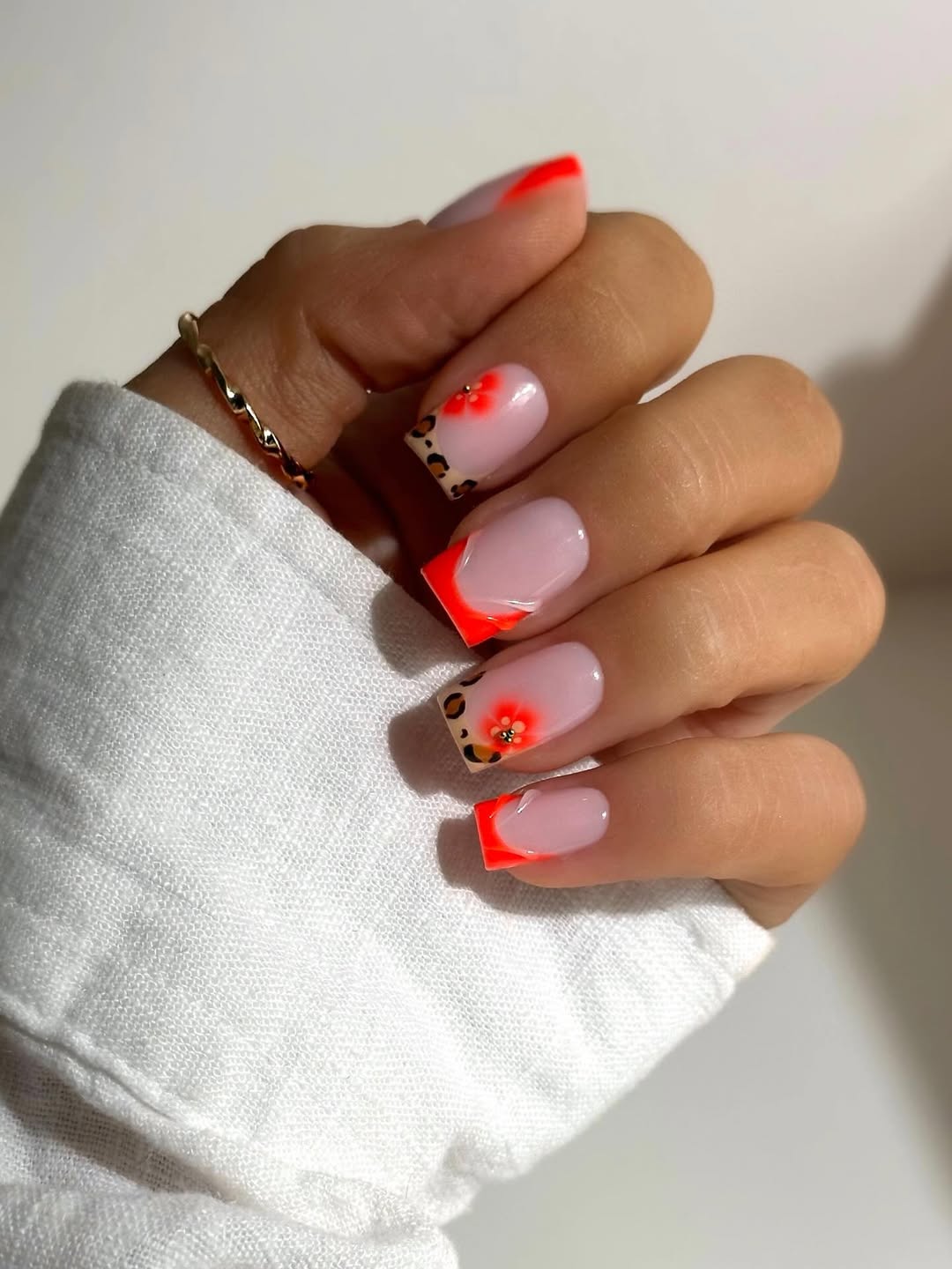 Neon Orange French Tips with Leopard Print Accent