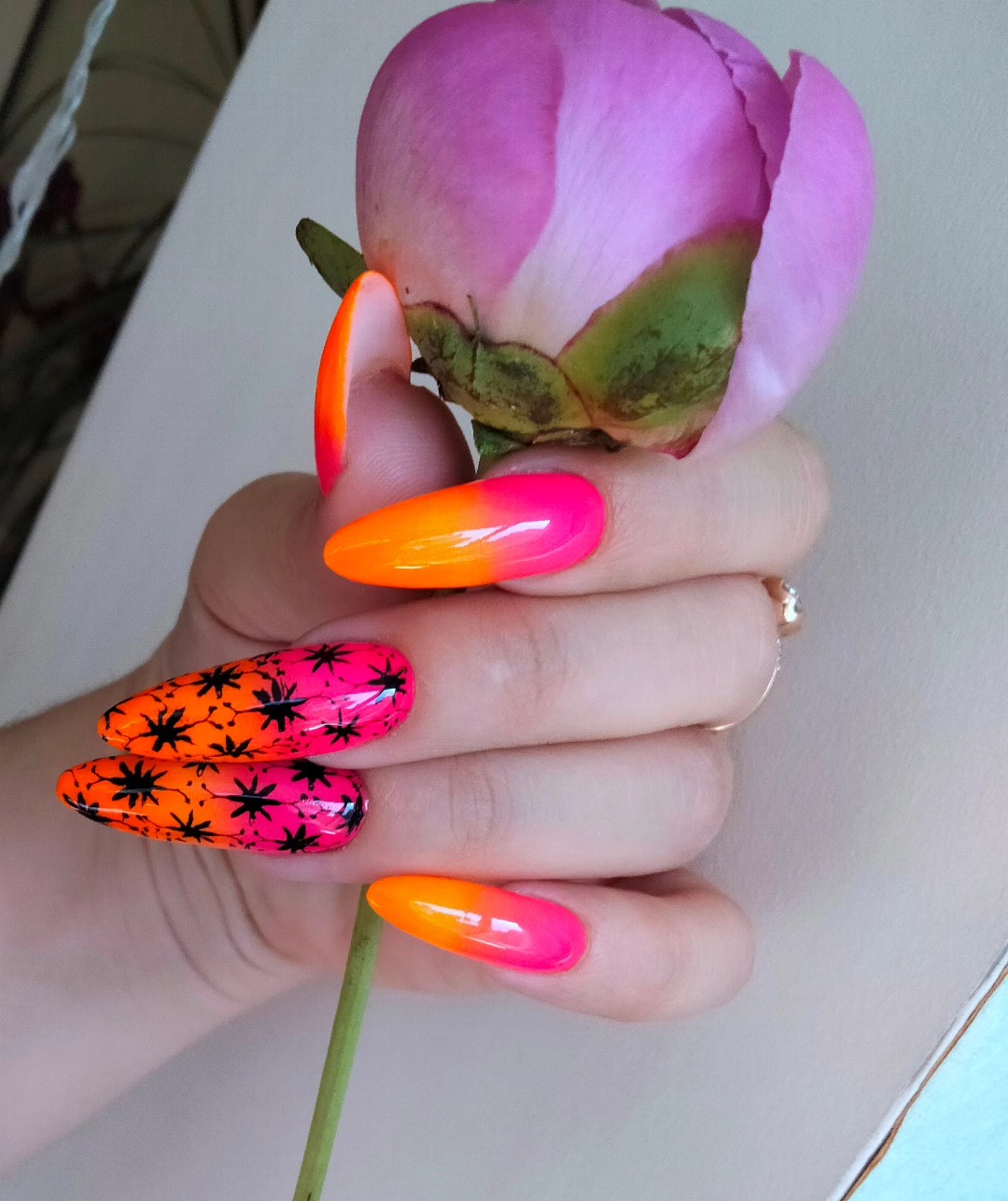 Neon Pink Orange Ombre Glossy Coffin Nails with Black Stars