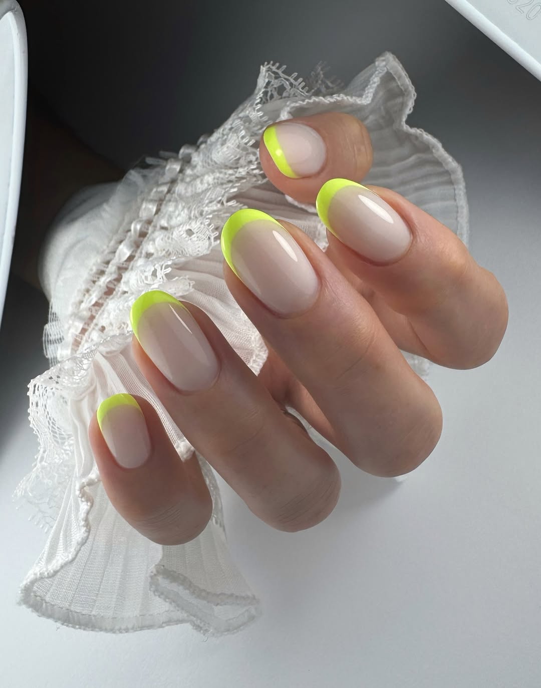 Neon Yellow French Tip Oval Nails