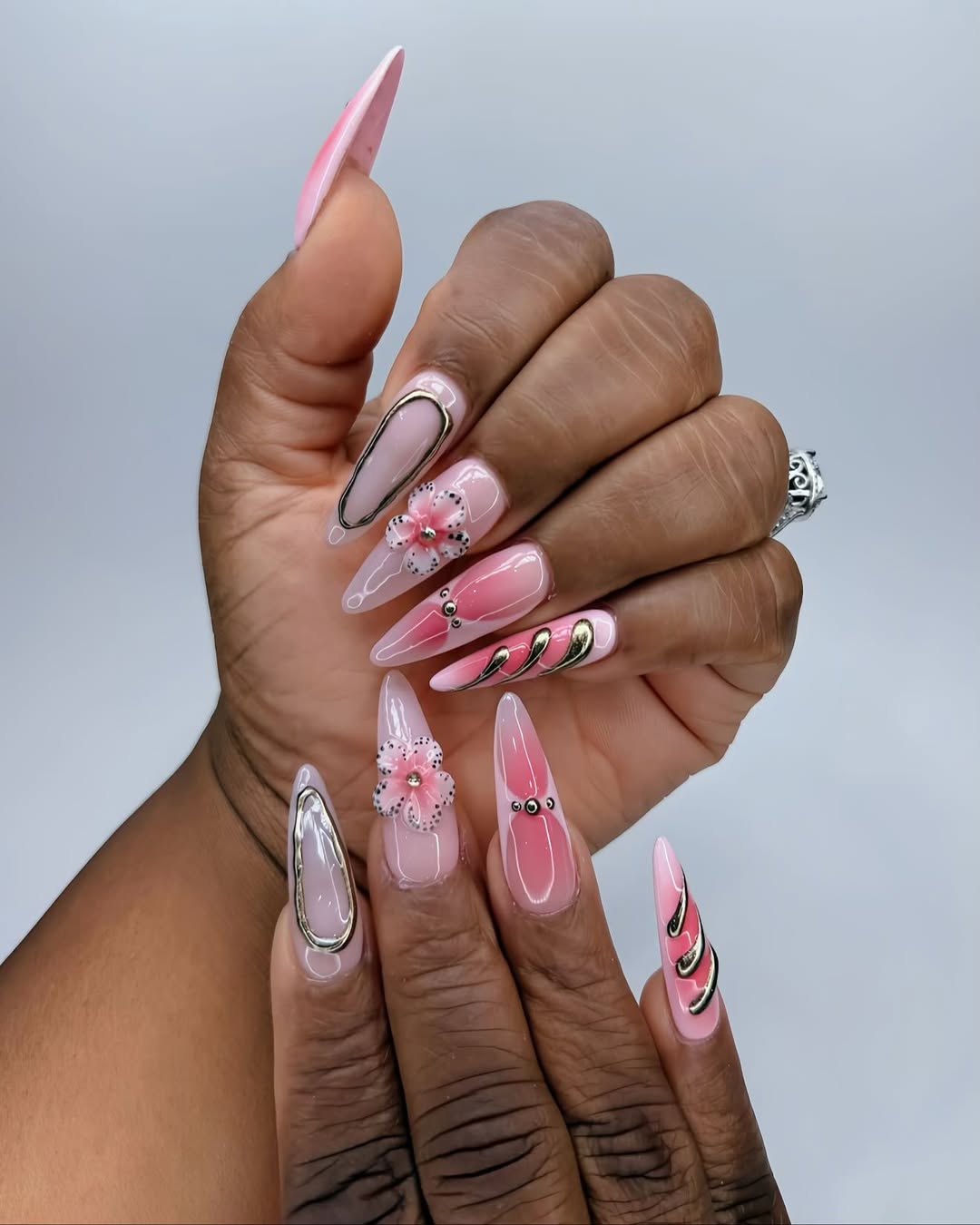Ombre Pink Stiletto Nails with 3D Flowers and Gold Accents
