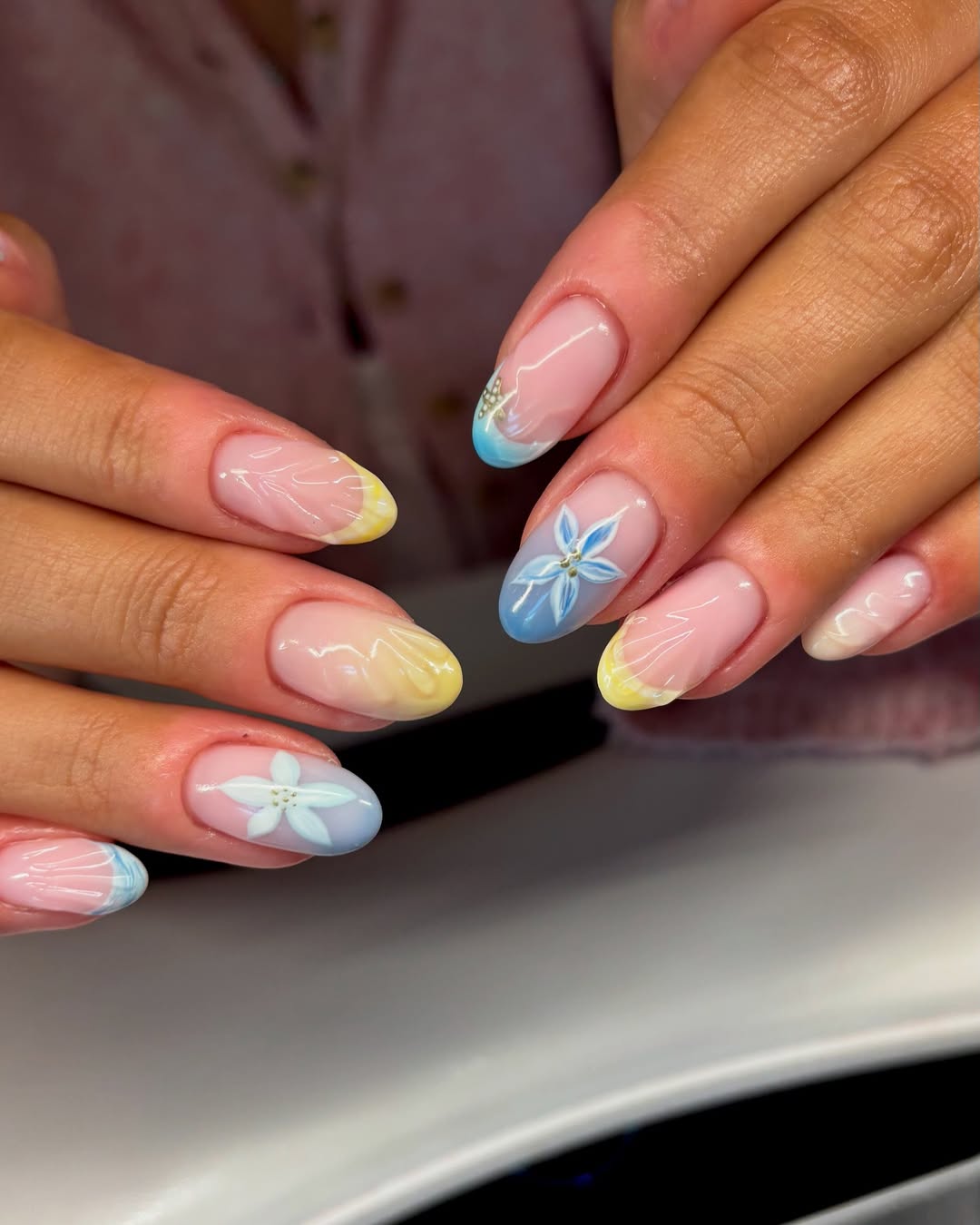 Pastel Blue Yellow Floral French Tip Almond Nails