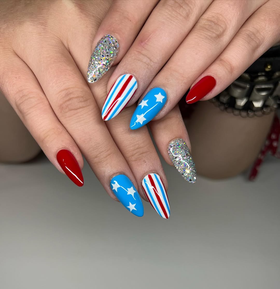 Patriotic Sparkle Stiletto Nails with Stars and Stripes