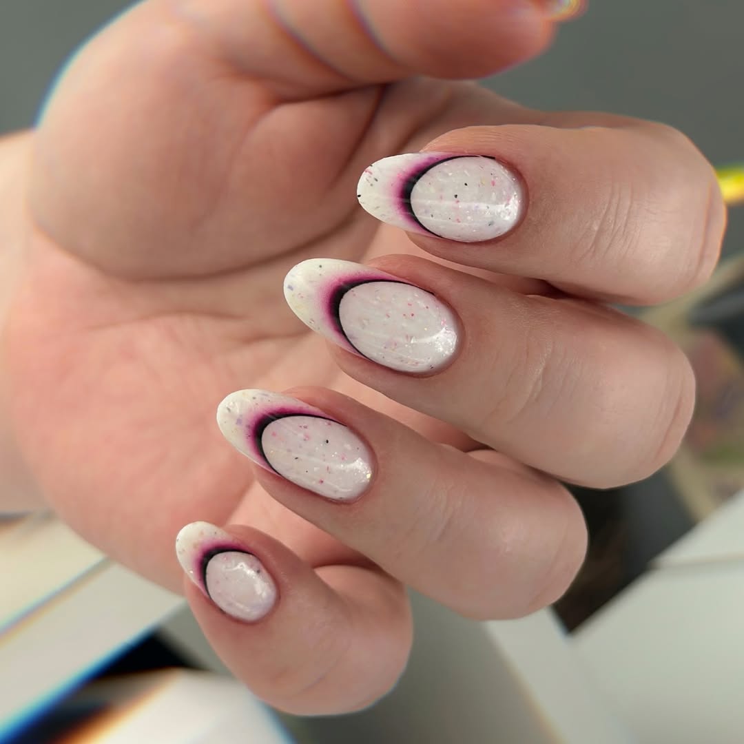 Pink Aura Speckled Glossy Almond Nails