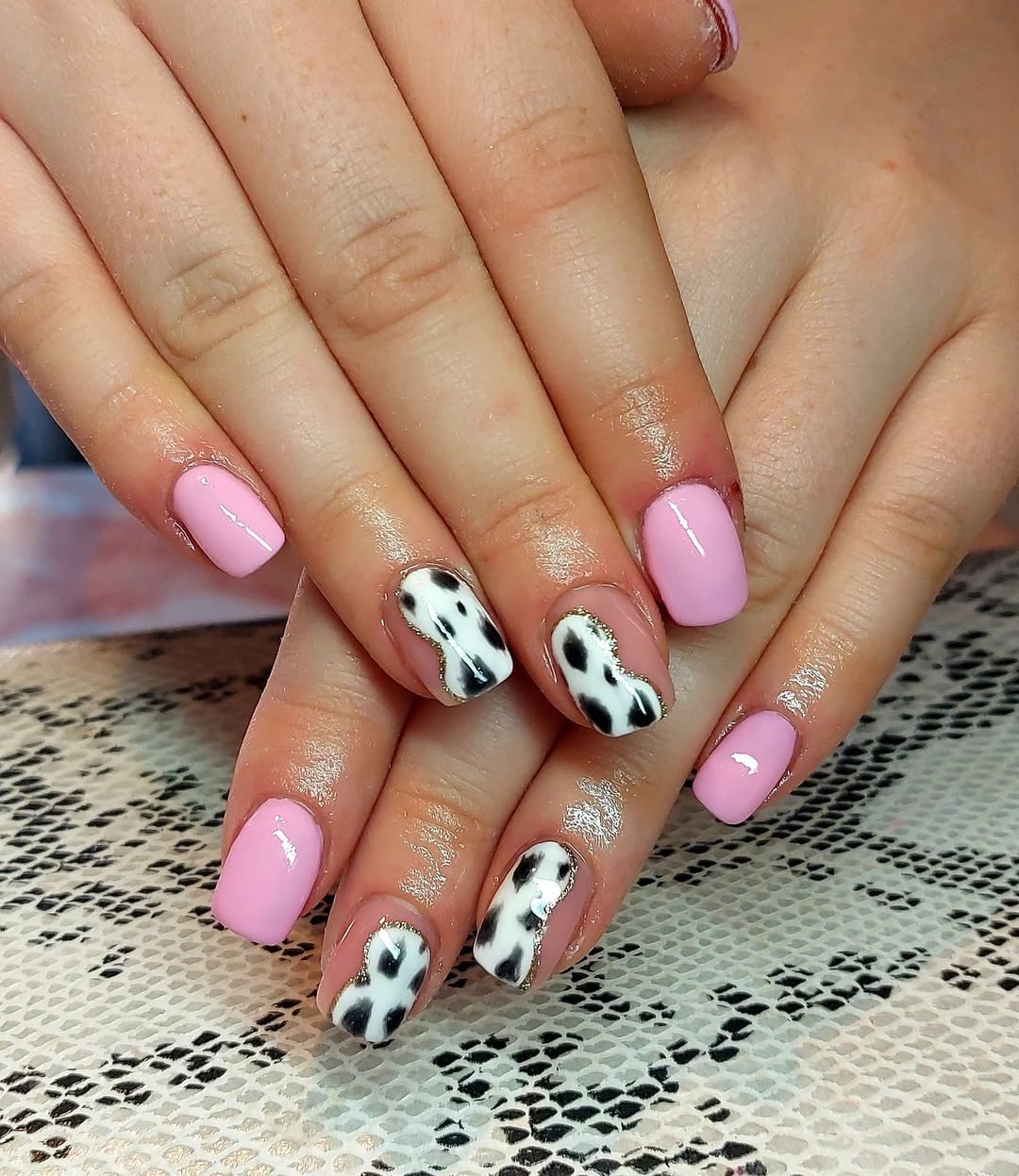 Pink Cow Print Gel Nails With Gold Outline