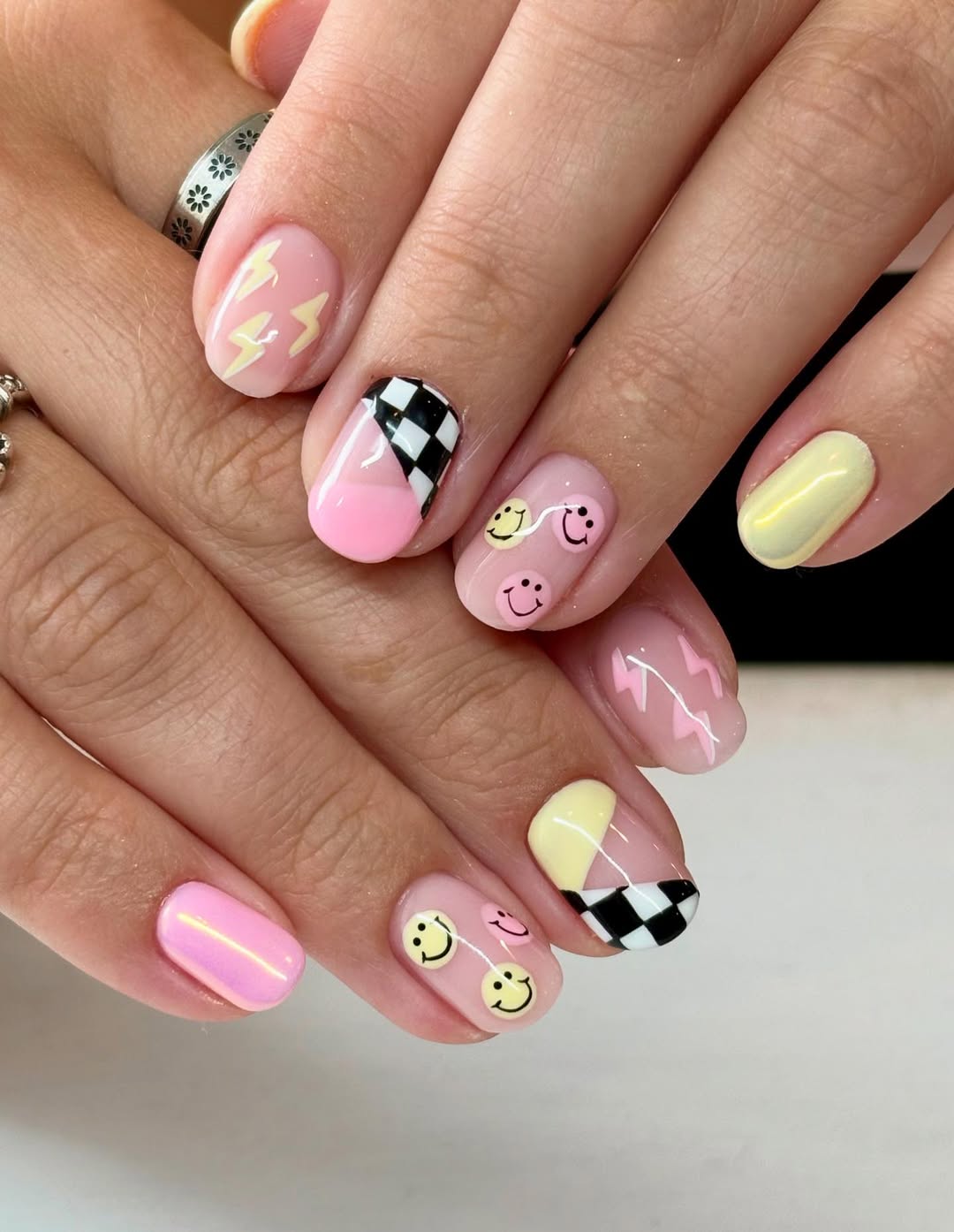 Playful Pastel Smiley Lightning Checkerboard Mix Match Nails