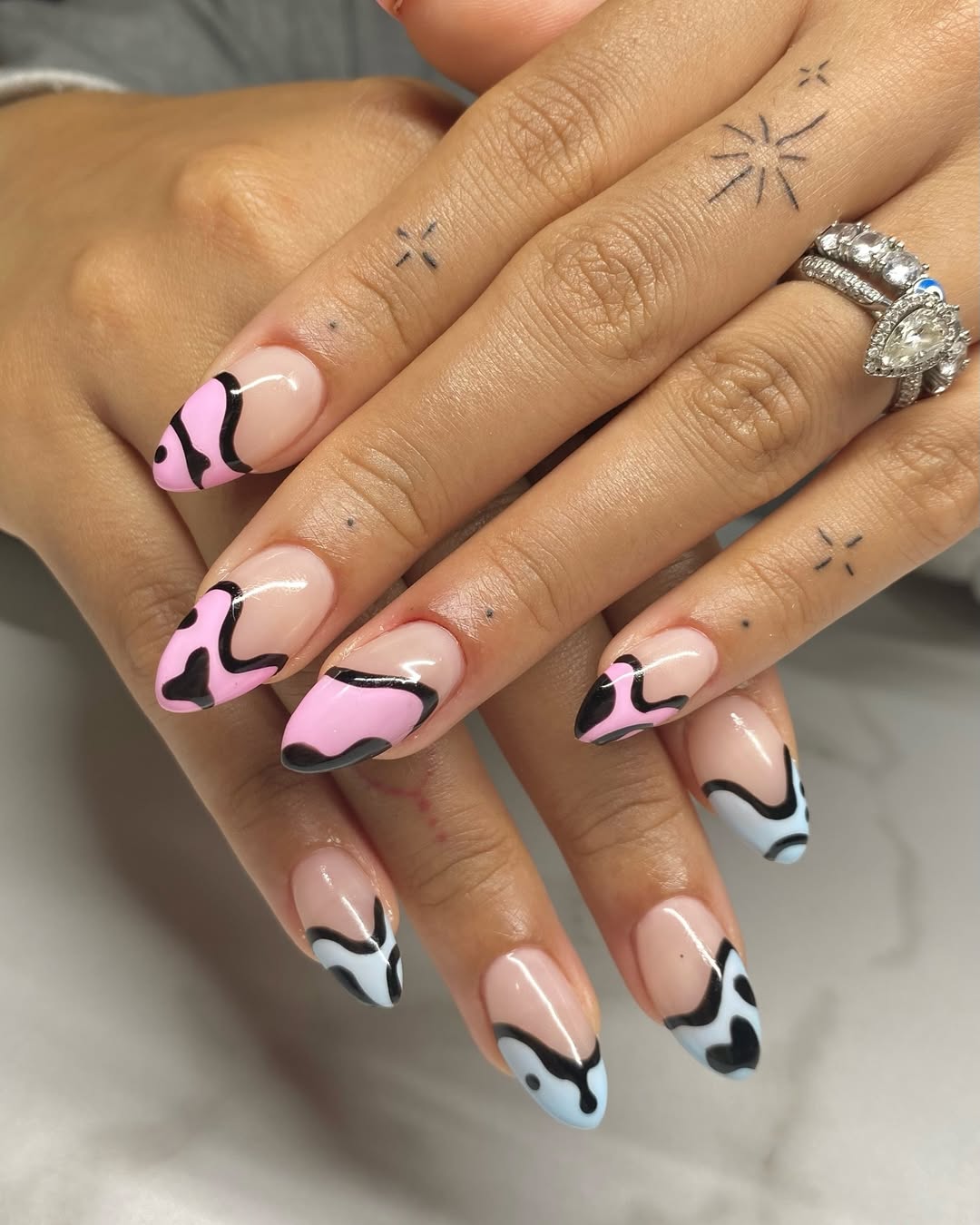 Playful Pink and Blue Abstract Swirl Almond Nails