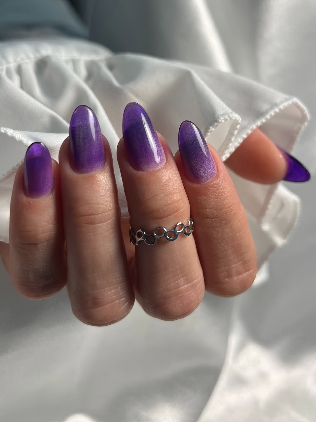 Radiant Purple Jelly Cat Eye Almond Nails