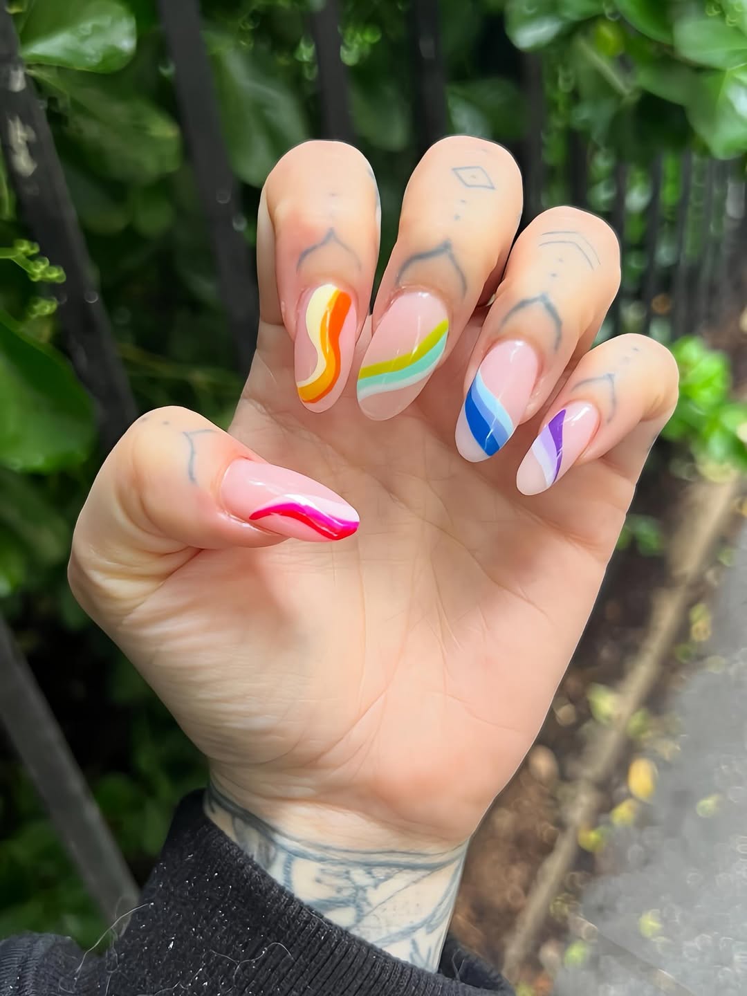 Rainbow Swirl Accent Nude Glossy Almond Coffin Nails