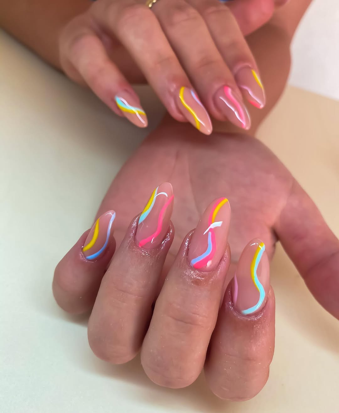 Rainbow Swirls Nude Almond Nails