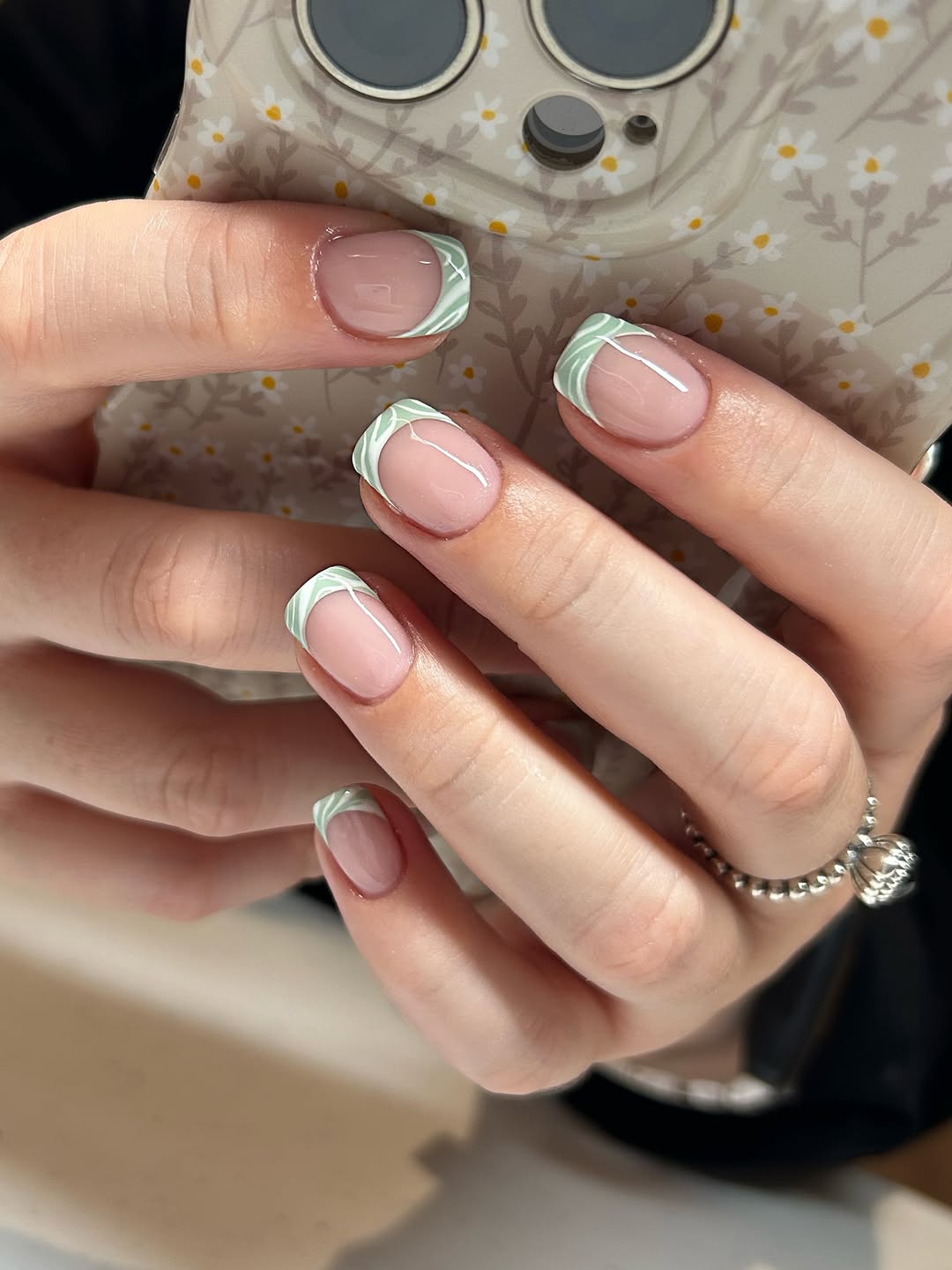 Soft Green Swirl French Tip Glossy Gel Nails