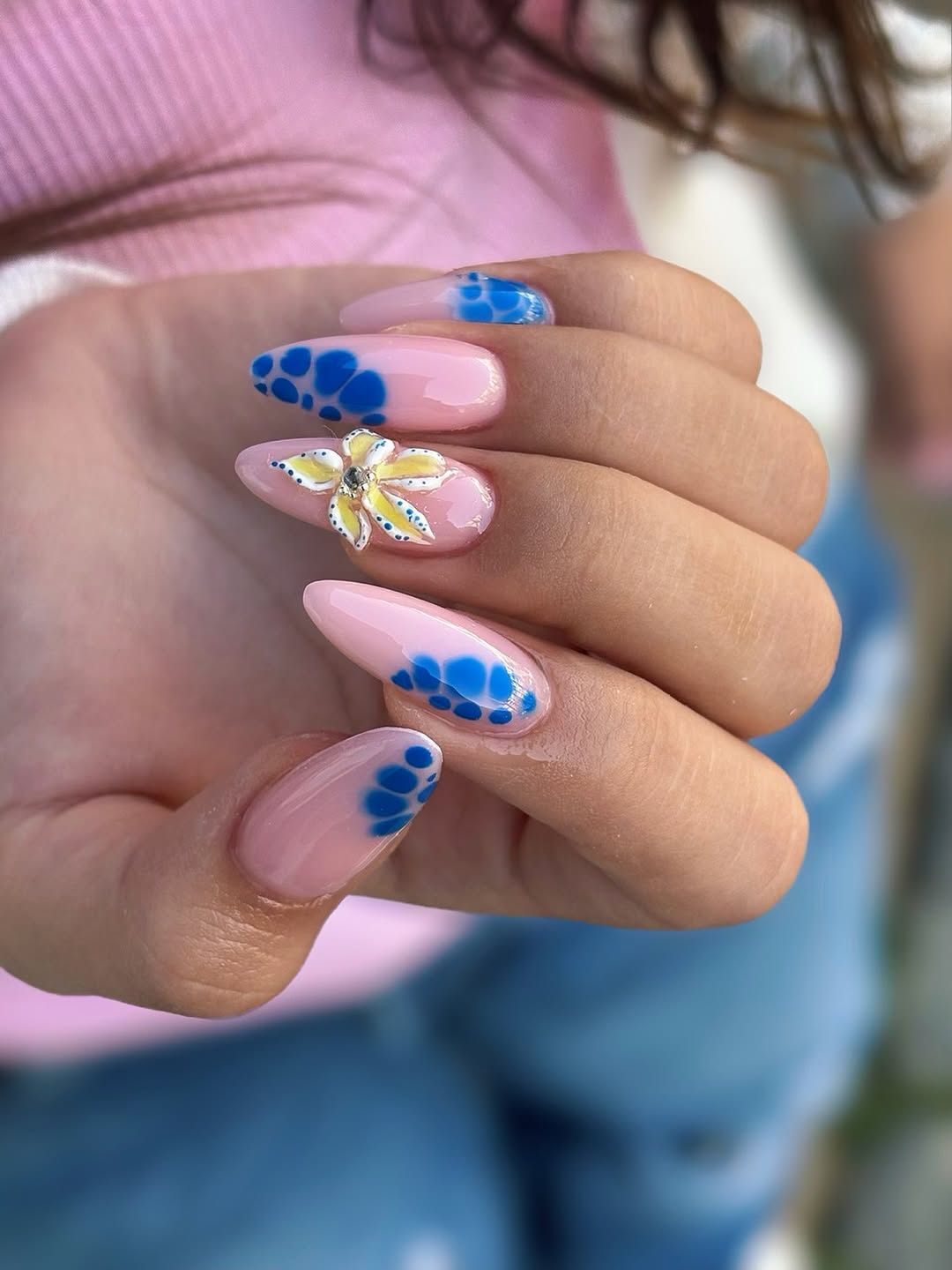 Soft Pink Almond Nails Blue Spots and 3D Flower