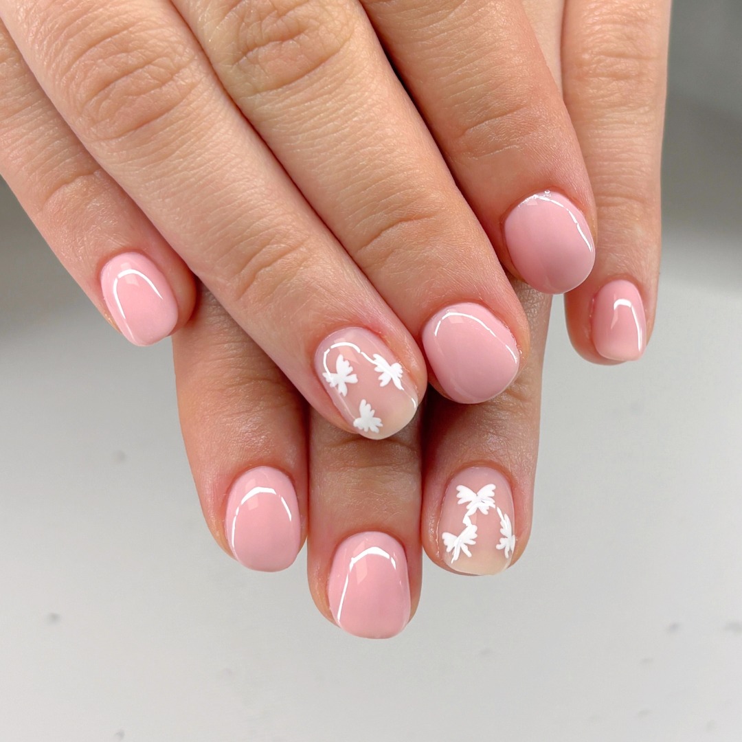 Soft Pink Nails with White Butterfly Art