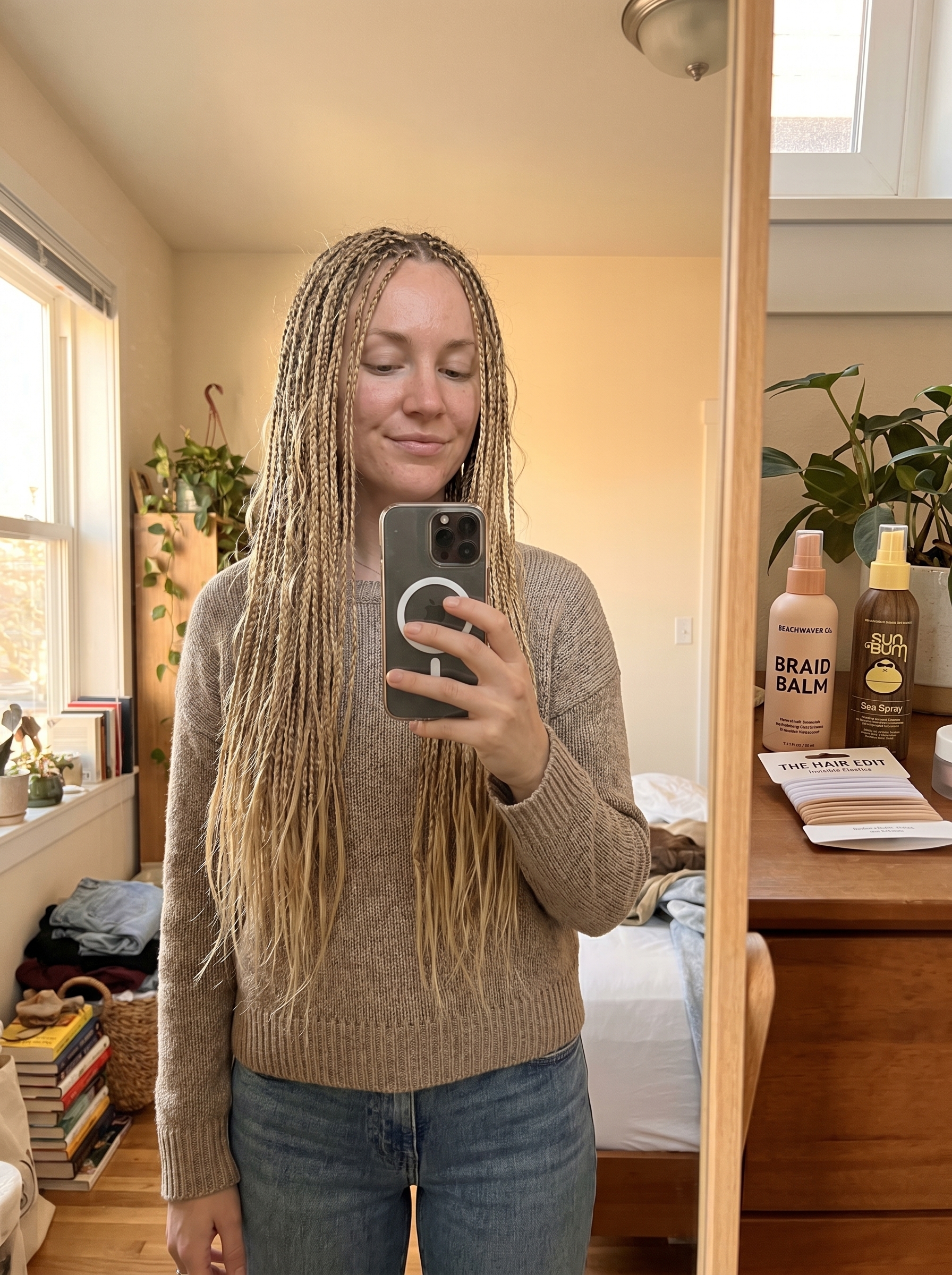 Playful Coastal Cowgirl Micro-Braids, a boho-chic soft summer hair idea 2026. This adventurous style is great for beach days or festivals, using clear elastic ties and sea salt spray.