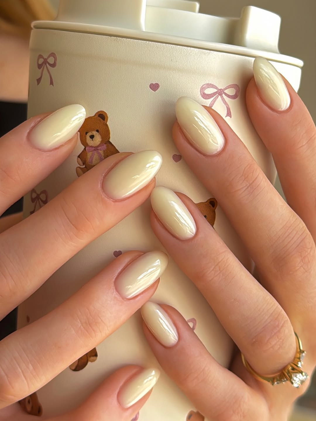Soft Yellow Glossy Oval Nails