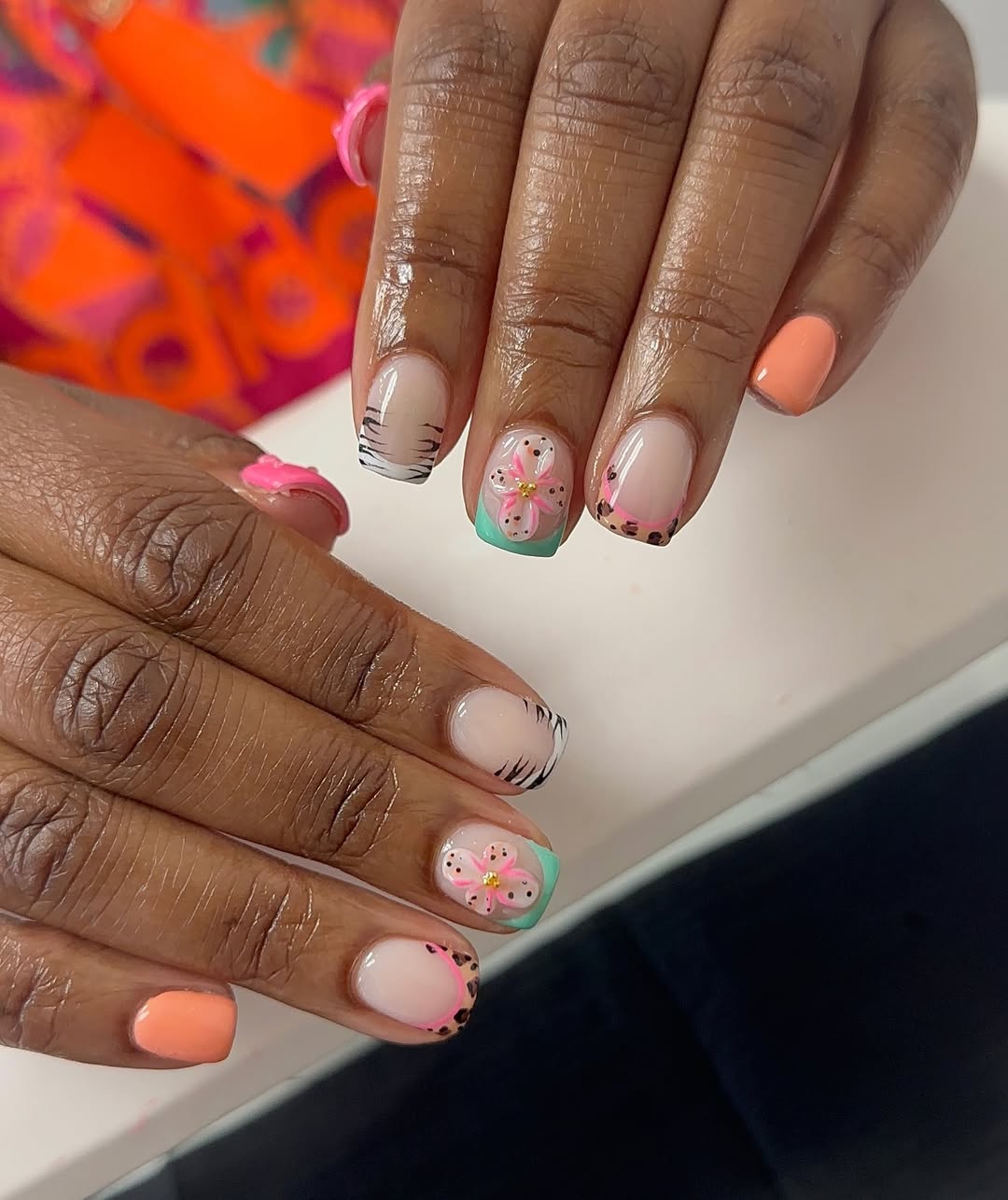 Summer Bright Gel Nails with Floral and Animal Print Accents