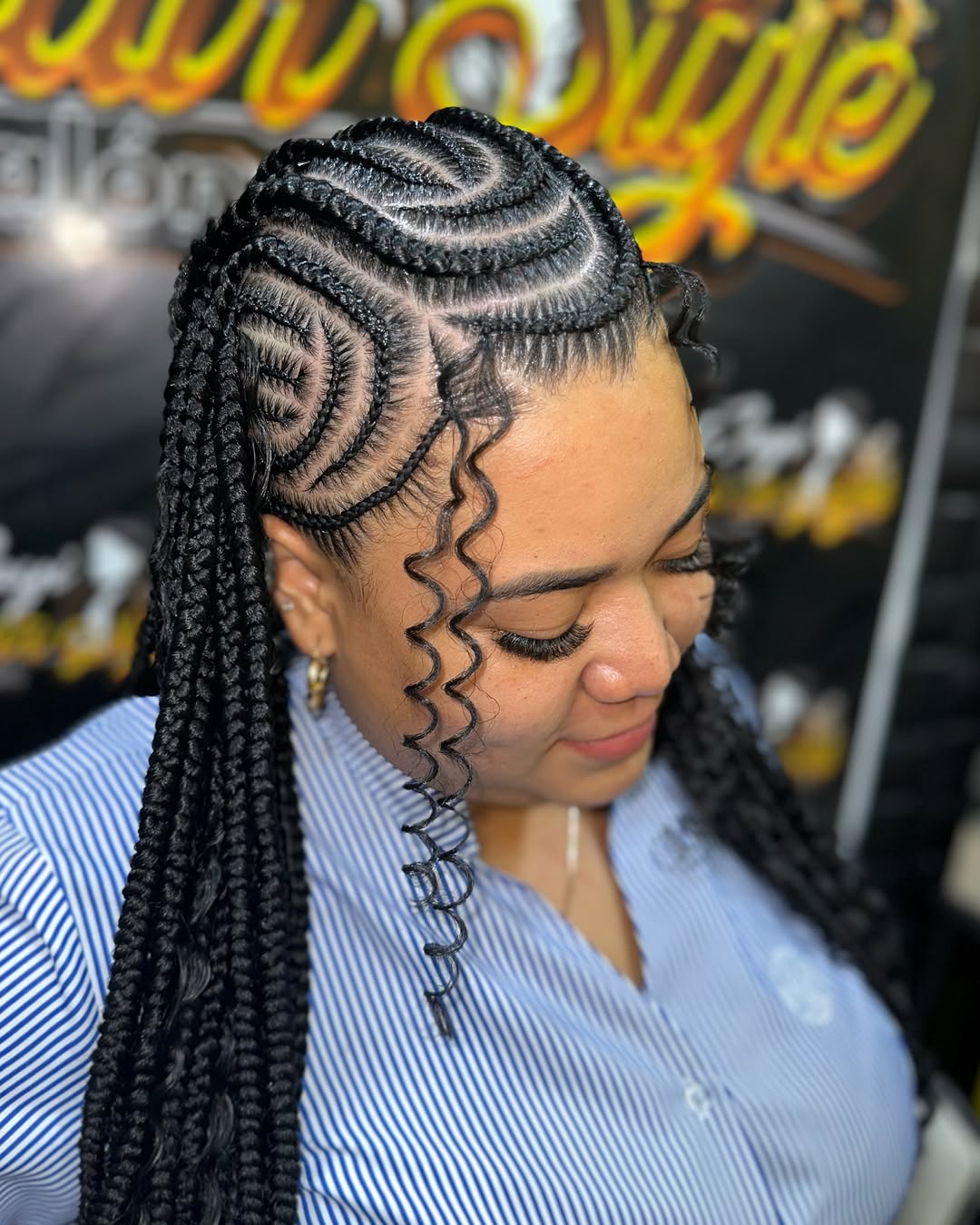 An elegant Black woman with medium-length, dark brown twists, perfect for summer hairstyles for black women 2026. She wears a soft yellow top and smiles brightly.