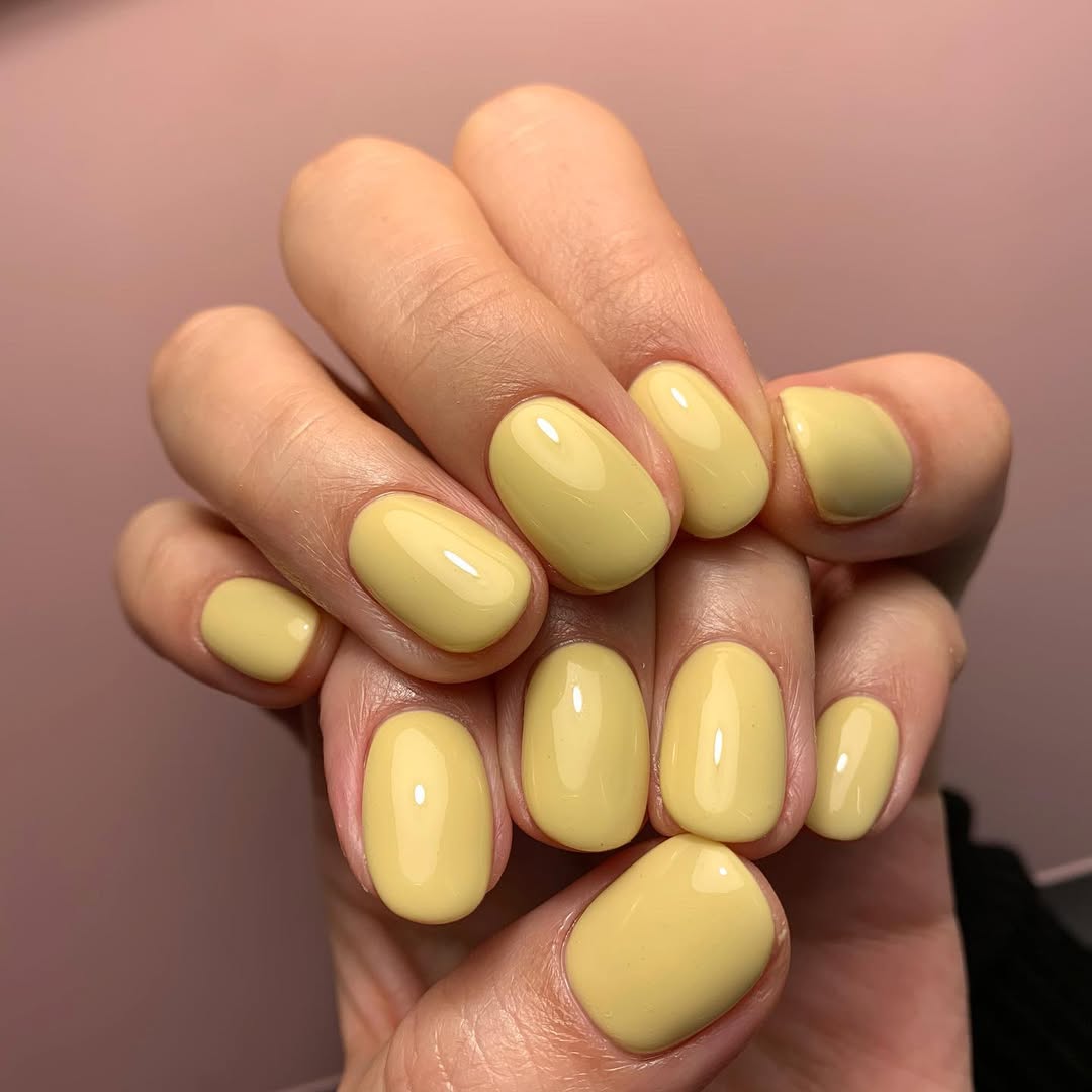 Sunny Yellow Glossy Oval Nails
