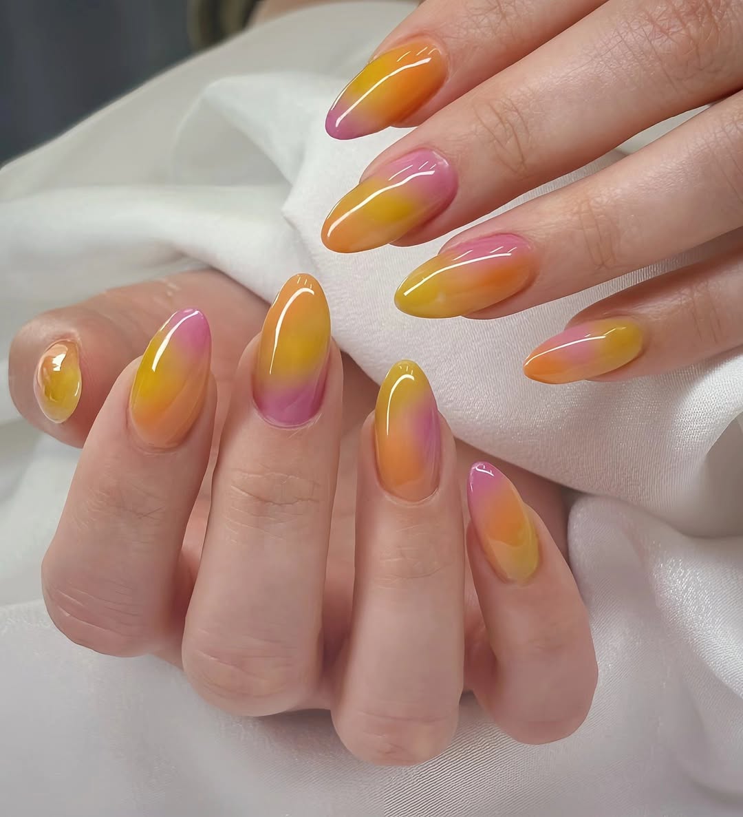 Sunset Aura Pink Orange Ombre Almond Nails