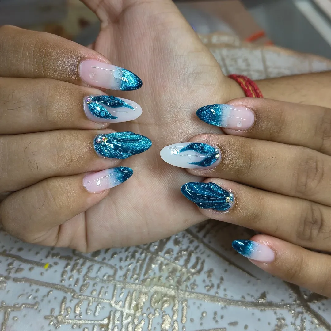 Teal Blue Ocean Wave Almond Nails