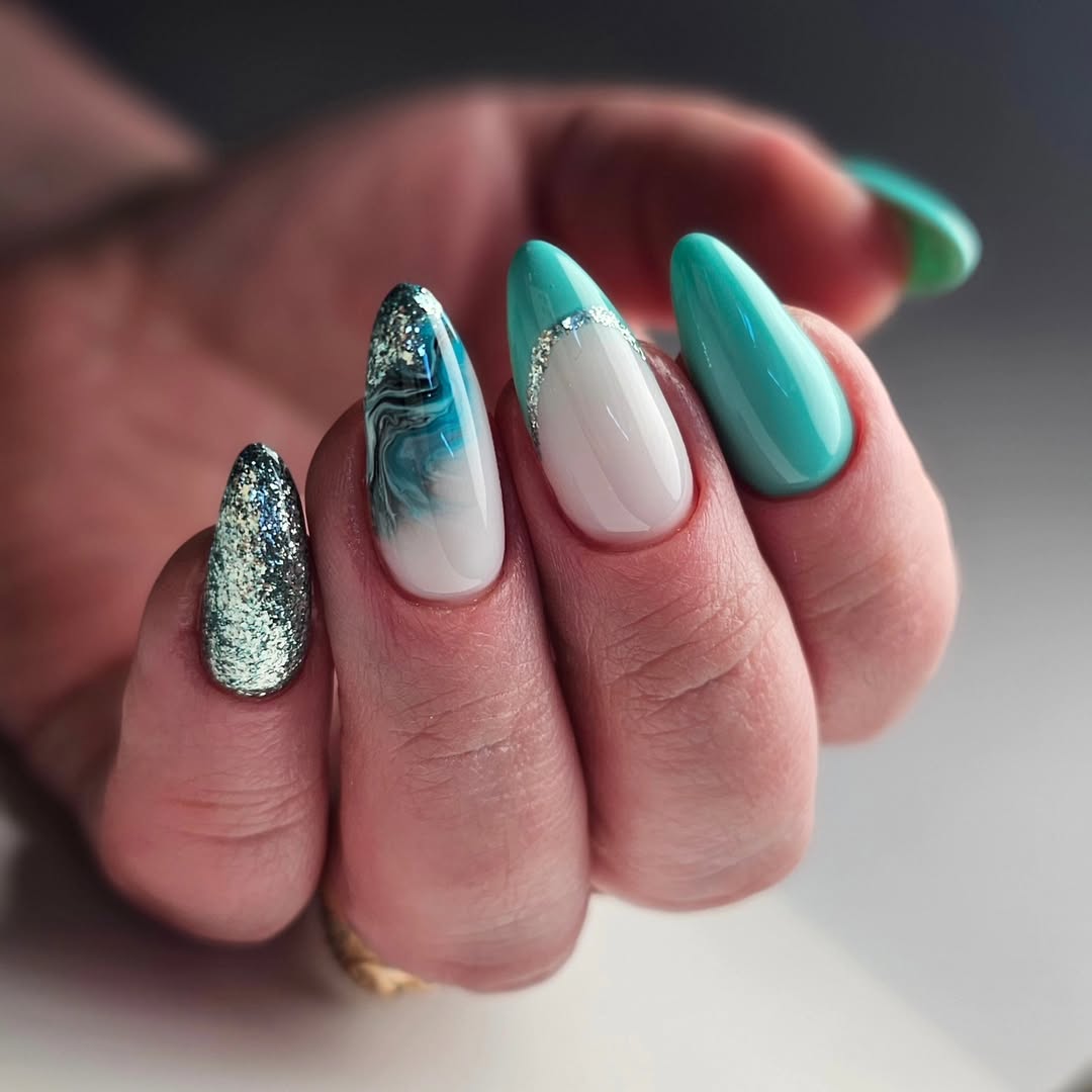 Teal Glitter Marble Almond Nails with Silver Accents