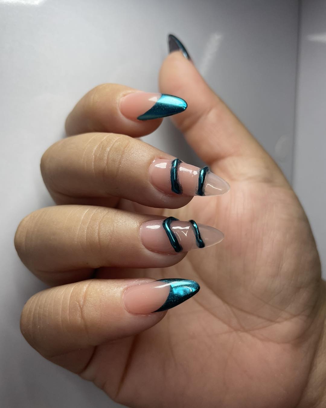 Teal Metallic French Tips With 3D Swirls
