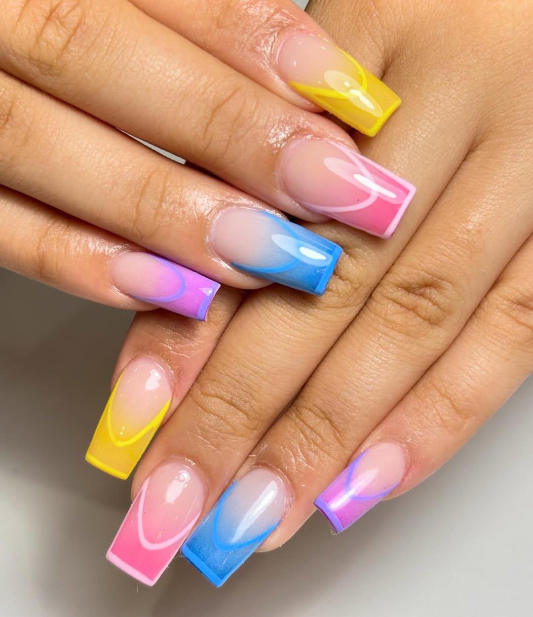 Vibrant Abstract Rainbow French Tip Coffin Nails