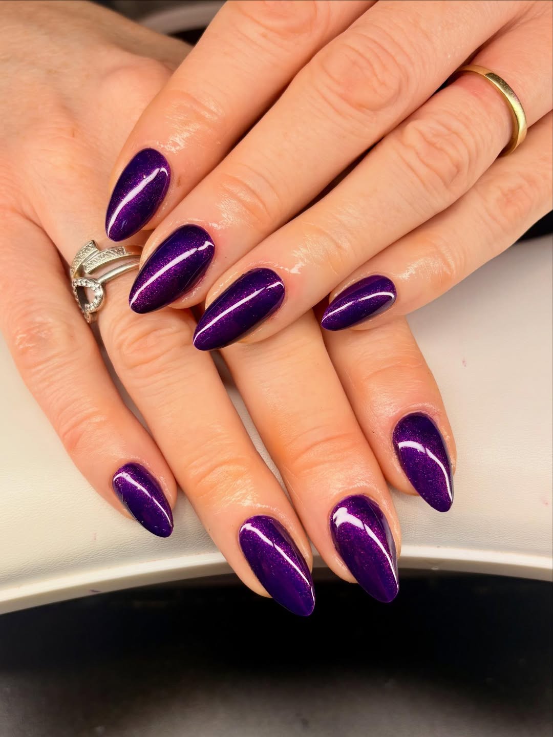 Vibrant Amethyst Purple Cat Eye Almond Nails