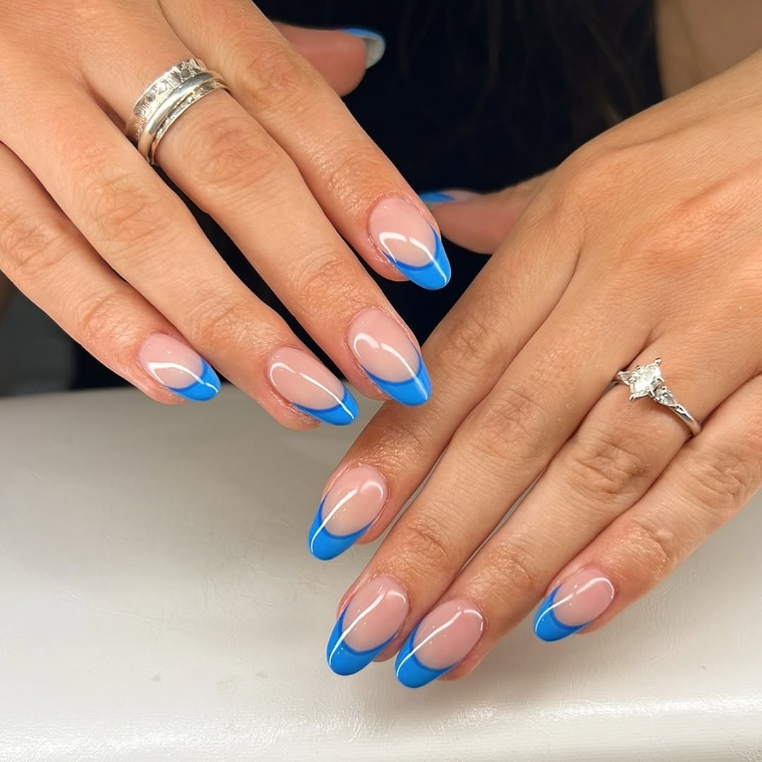 Vibrant Blue Glossy Rounded French Tips