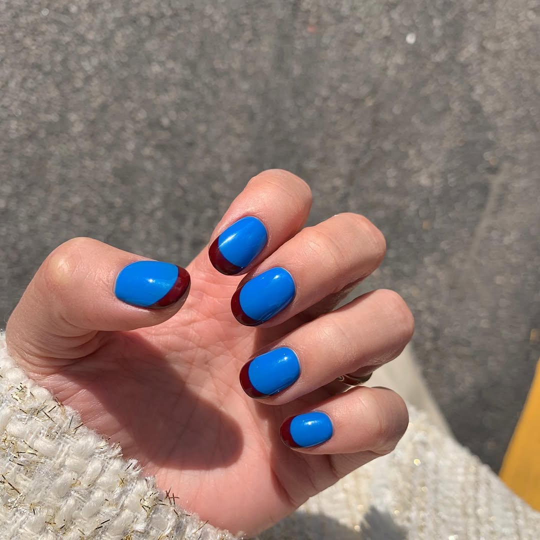 Vibrant Blue Reverse French with Burgundy Tips