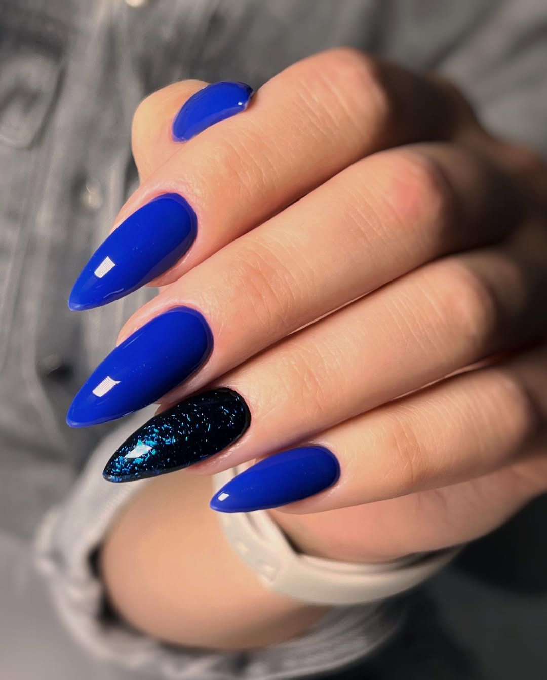 Vibrant Blue Stiletto with Glitter Accent Nails