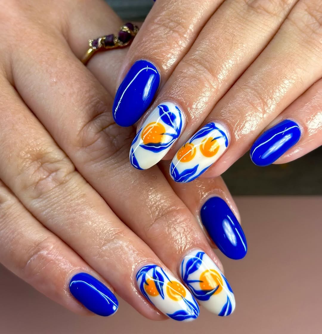 Vibrant Blue White Orange Floral Oval Nails