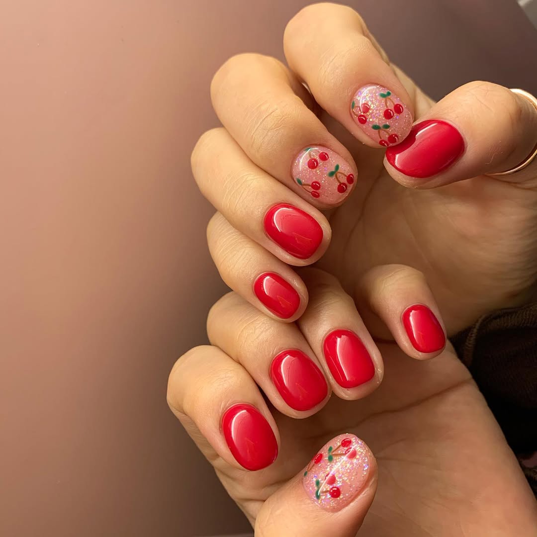 Vibrant Cherry Red Nails With Glitter Accent