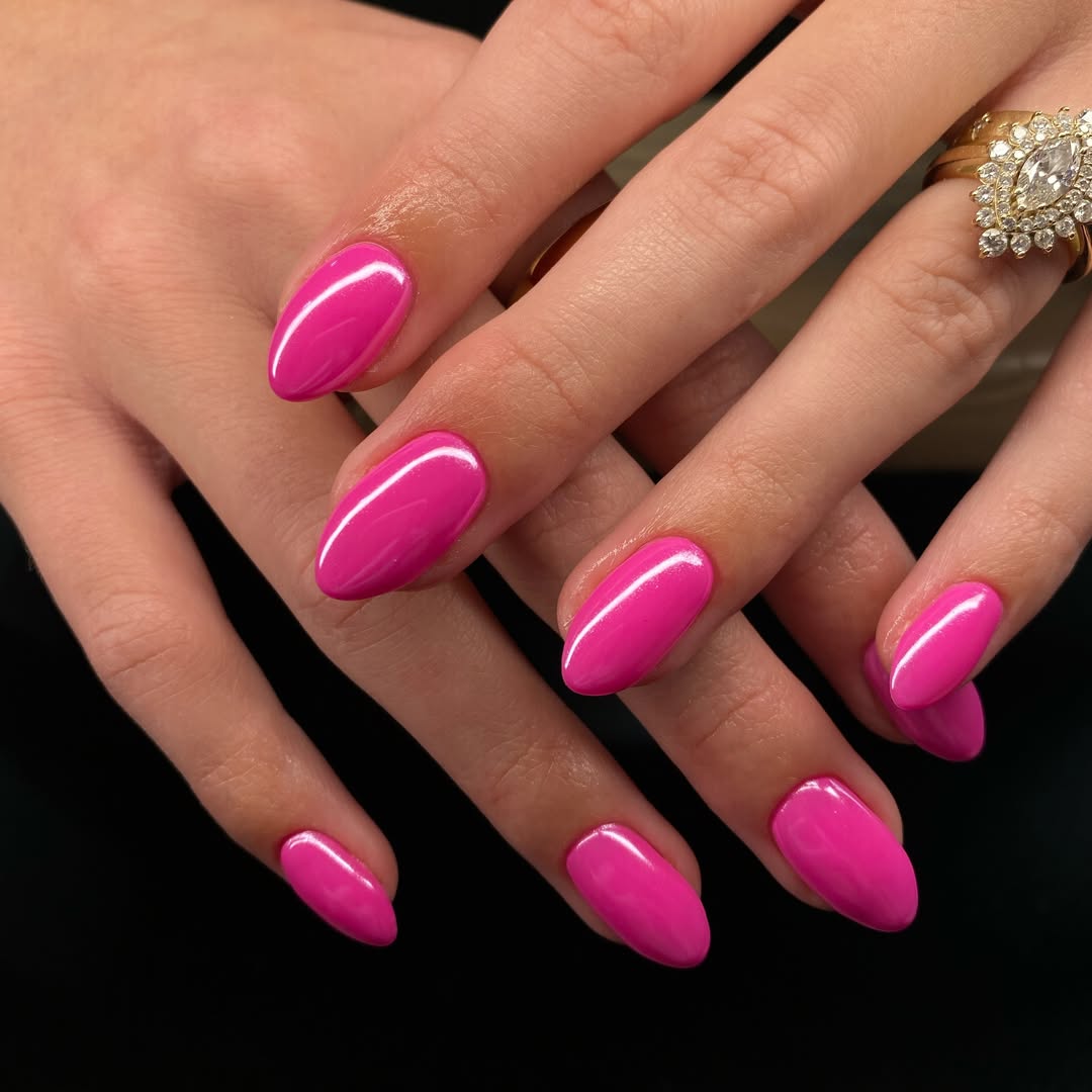 Vibrant Fuchsia Glossy Oval Gel Nails