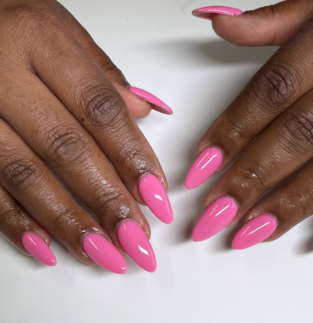 Vibrant Glossy Bubblegum Pink Stiletto Nails