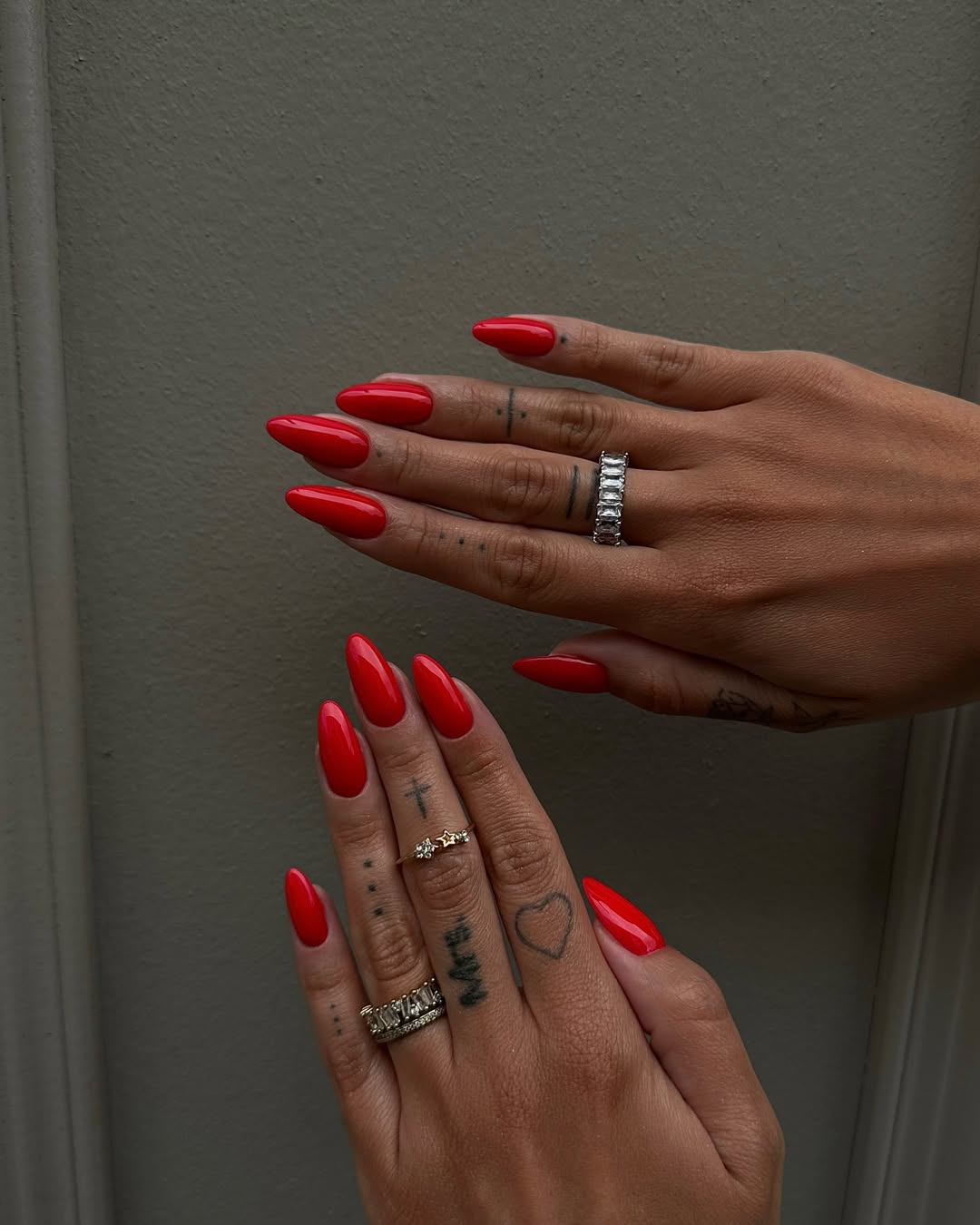 Vibrant Glossy Cherry Red Pointed Almond Nails