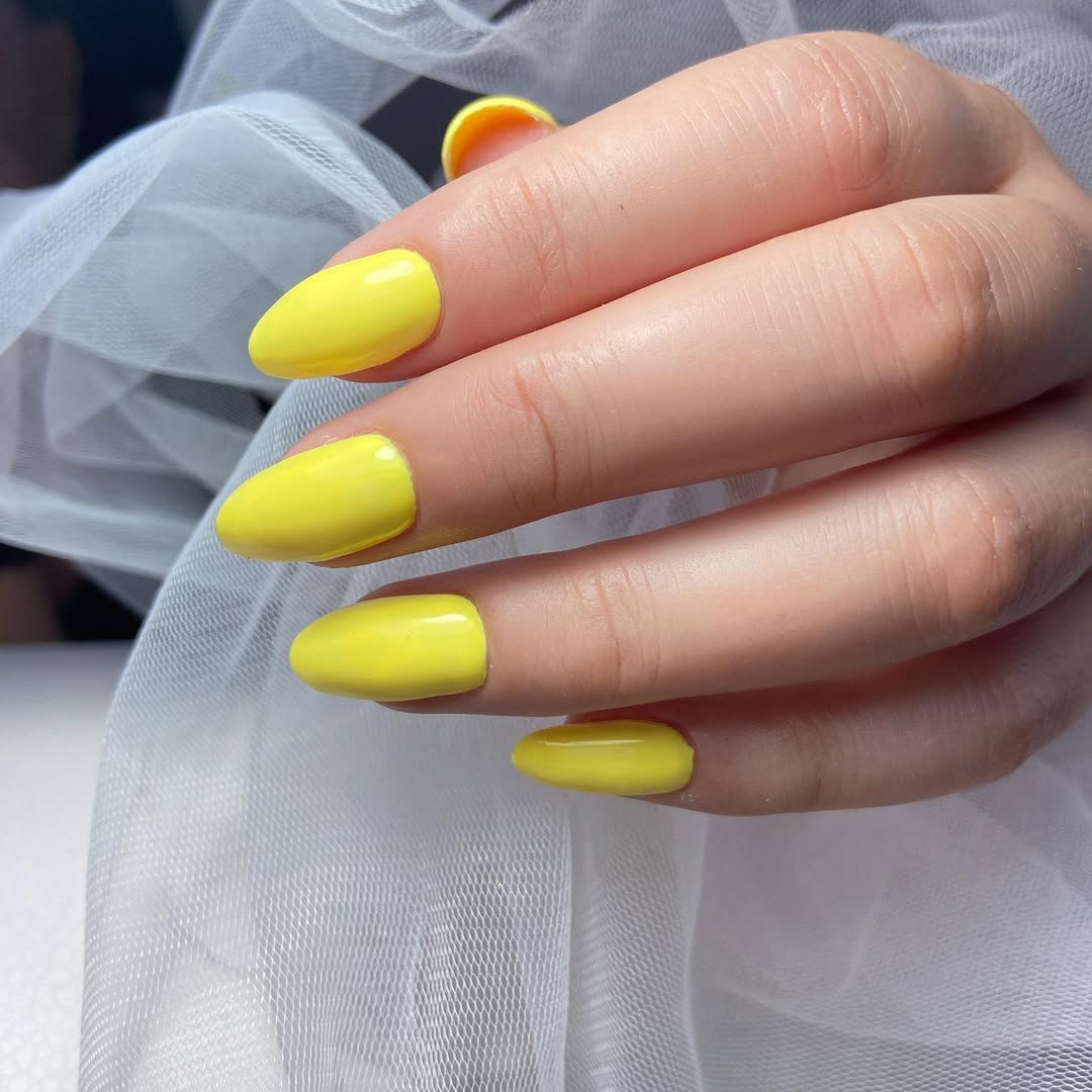 Vibrant Glossy Lemon Yellow Oval Nails