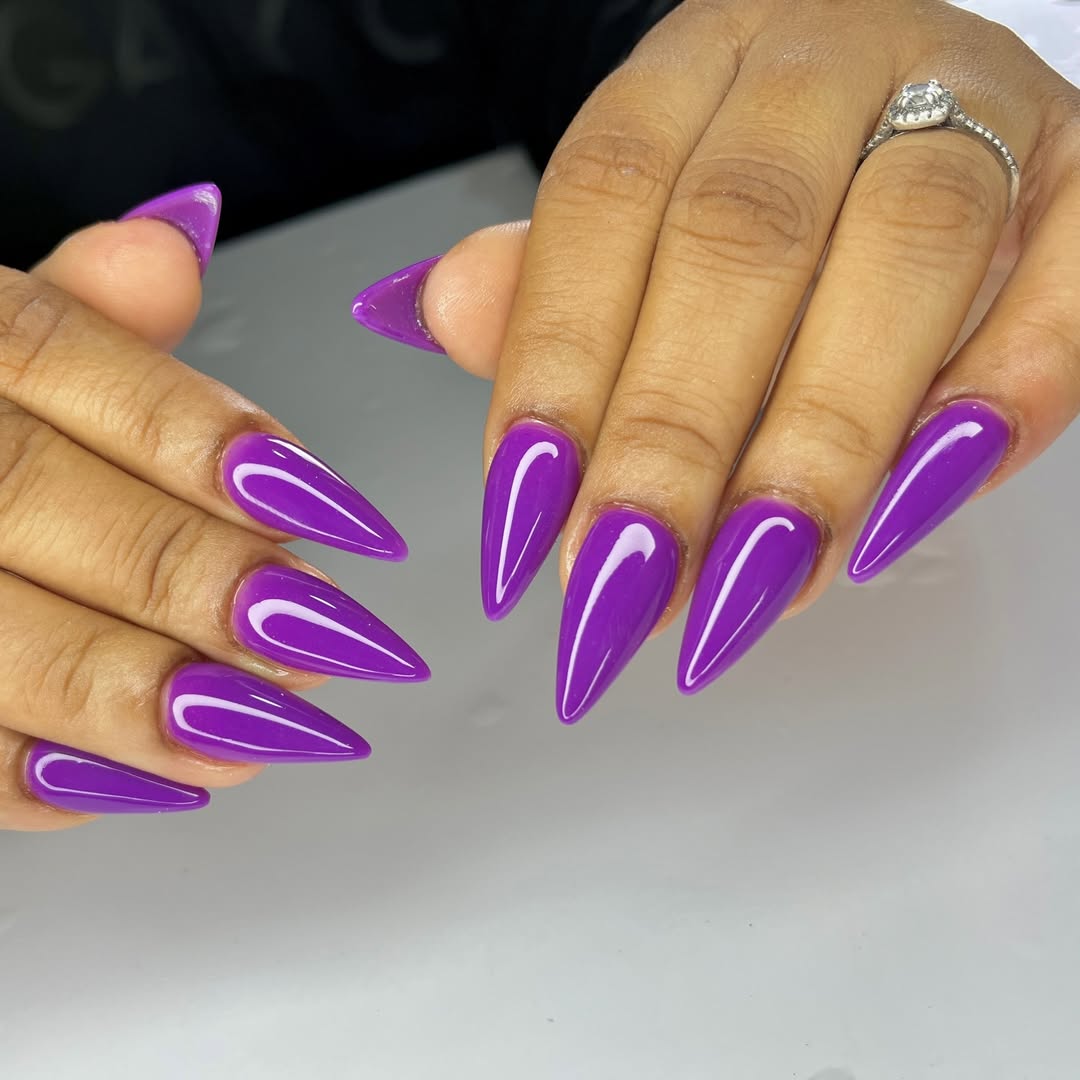 Vibrant Glossy Purple Stiletto Vacation Nails