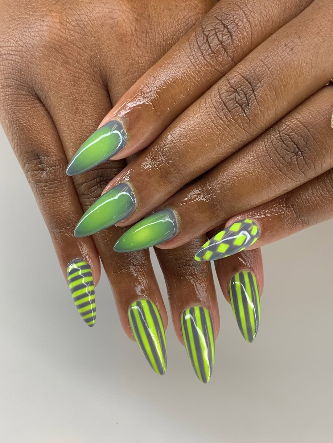Vibrant Green Grey Ombre Striped Stiletto Nails