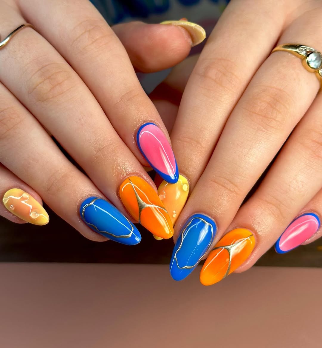 Vibrant Mismatched Almond Outline Nails with Gold Detail